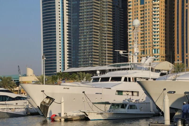 a couple of boats are parked in a harbor aboard O'NATALINA Yacht for Sale