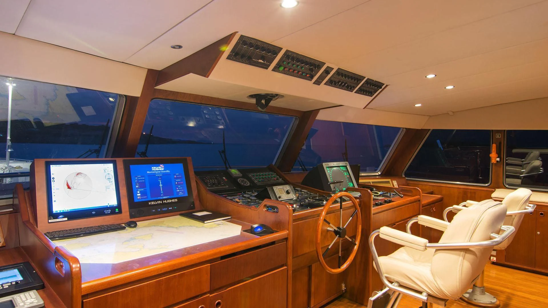 a room with computers and monitors aboard O'NATALINA Yacht for Sale