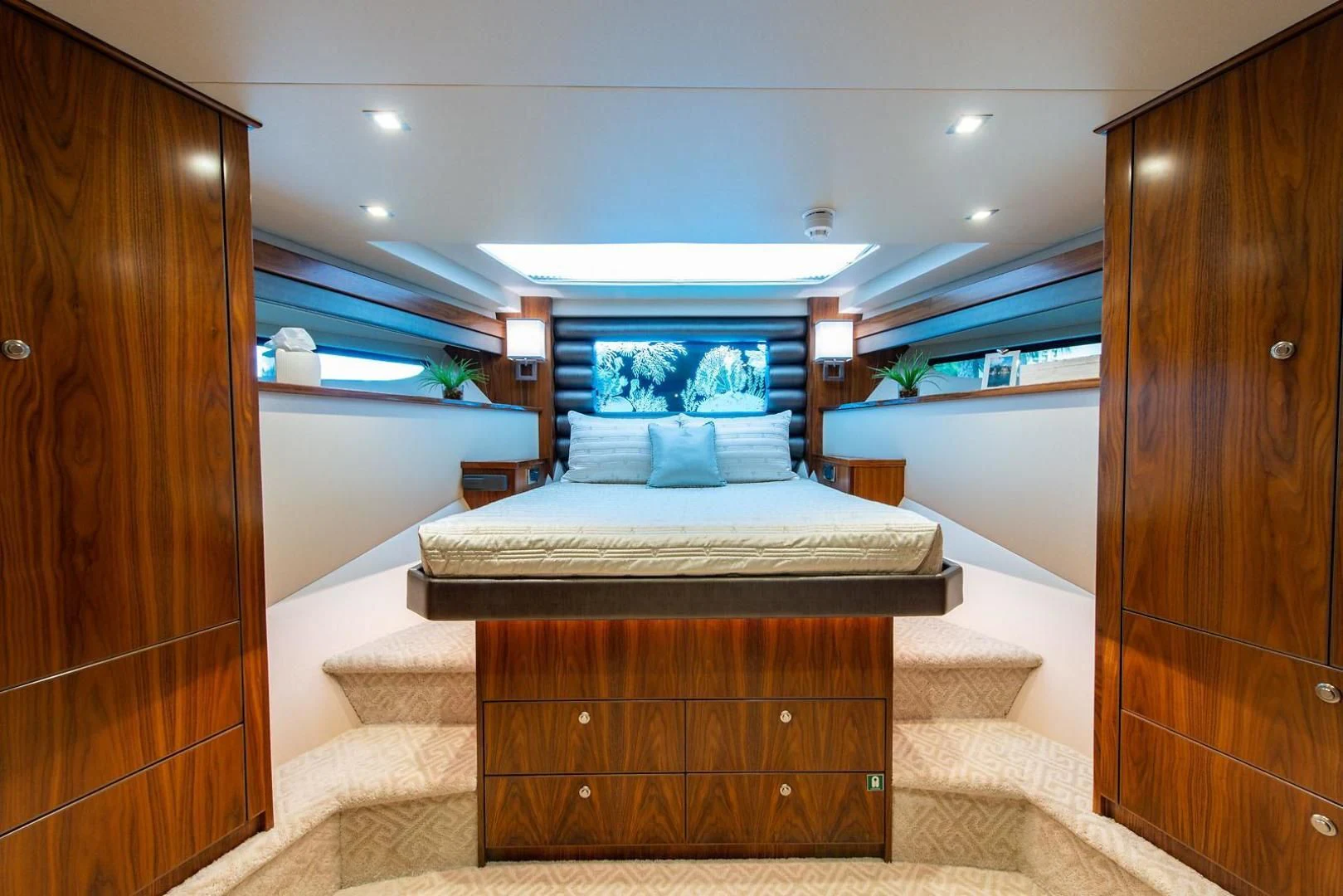 a bed in a room aboard OBSESSION Yacht for Sale