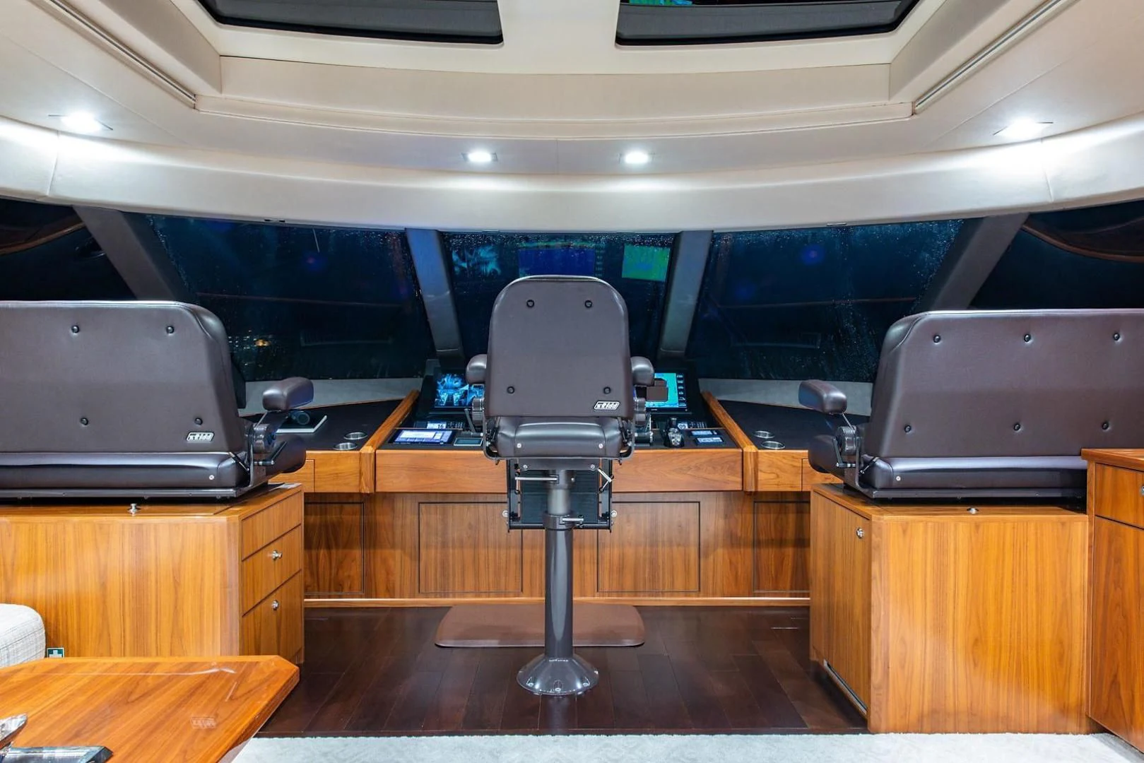 a room with a desk and a chair aboard OBSESSION Yacht for Sale