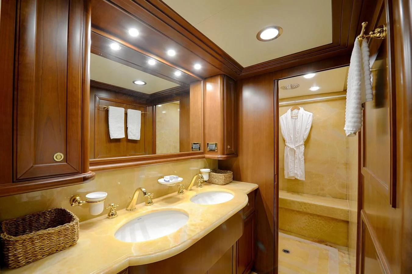 a bathroom with a sink and a mirror aboard HAG Yacht for Sale