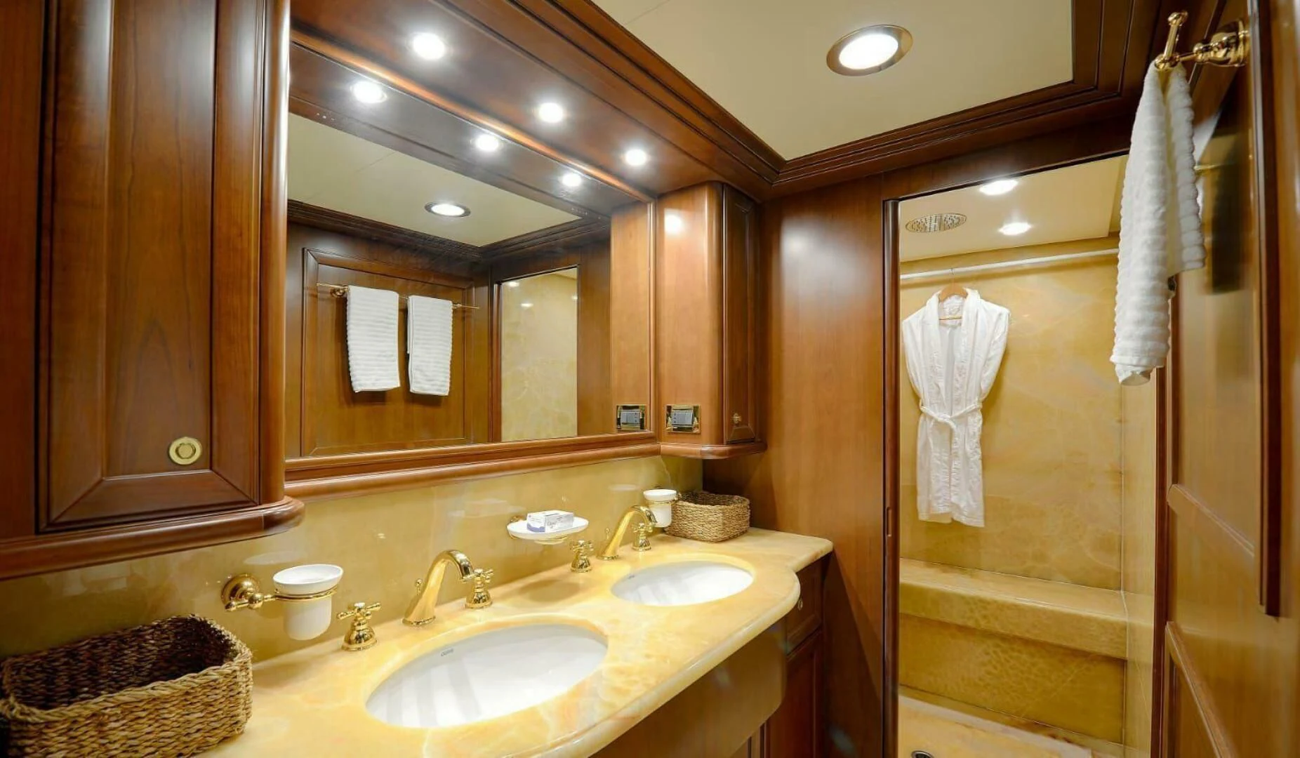 a bathroom with a large mirror aboard HAG Yacht for Sale