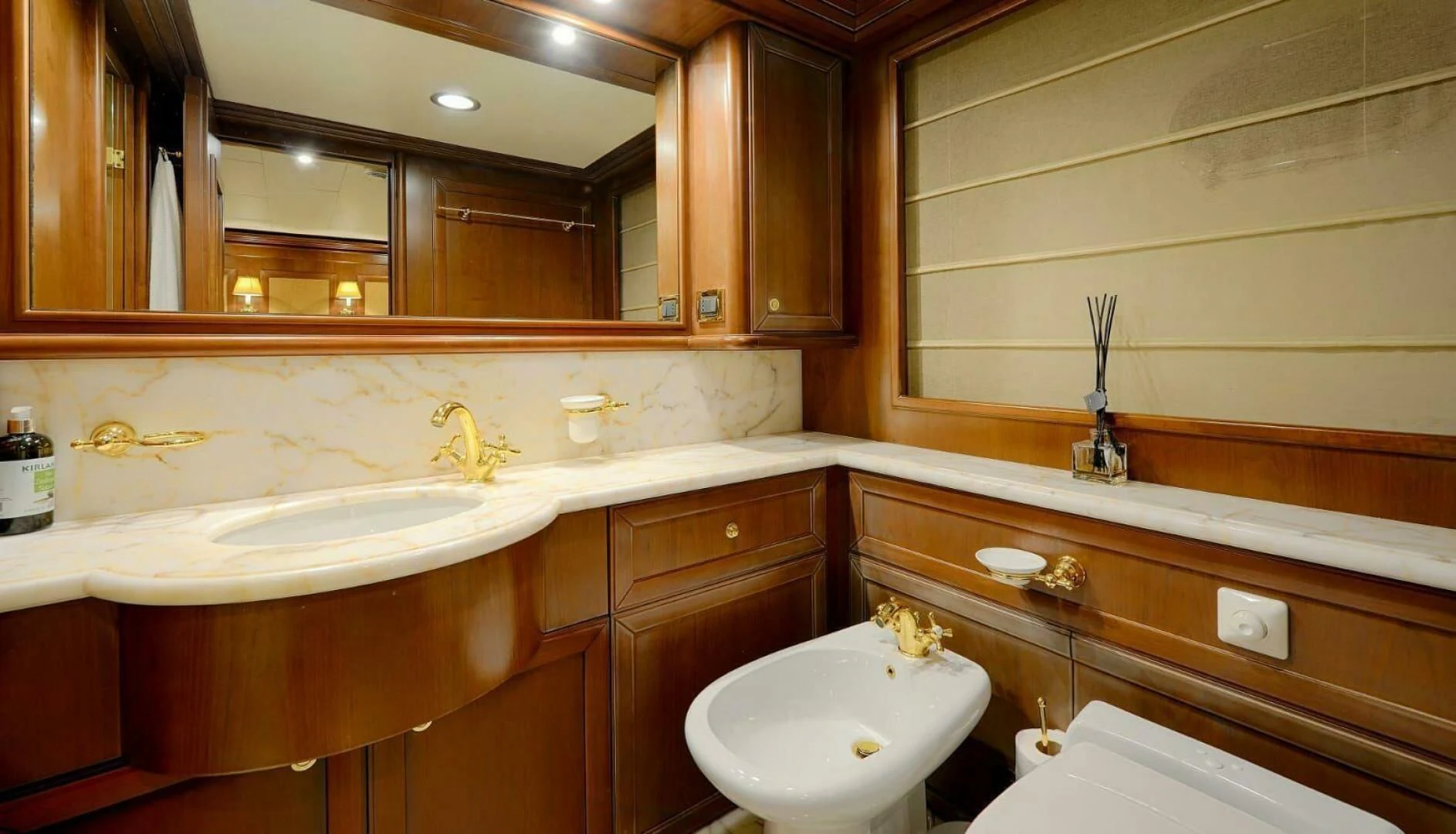 a bathroom with a sink and a mirror aboard HAG Yacht for Sale