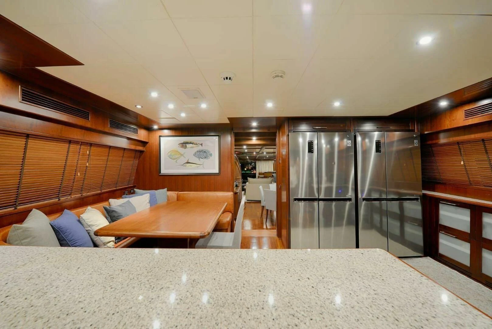 a room with a glass door and a couch and a table aboard HAG Yacht for Sale