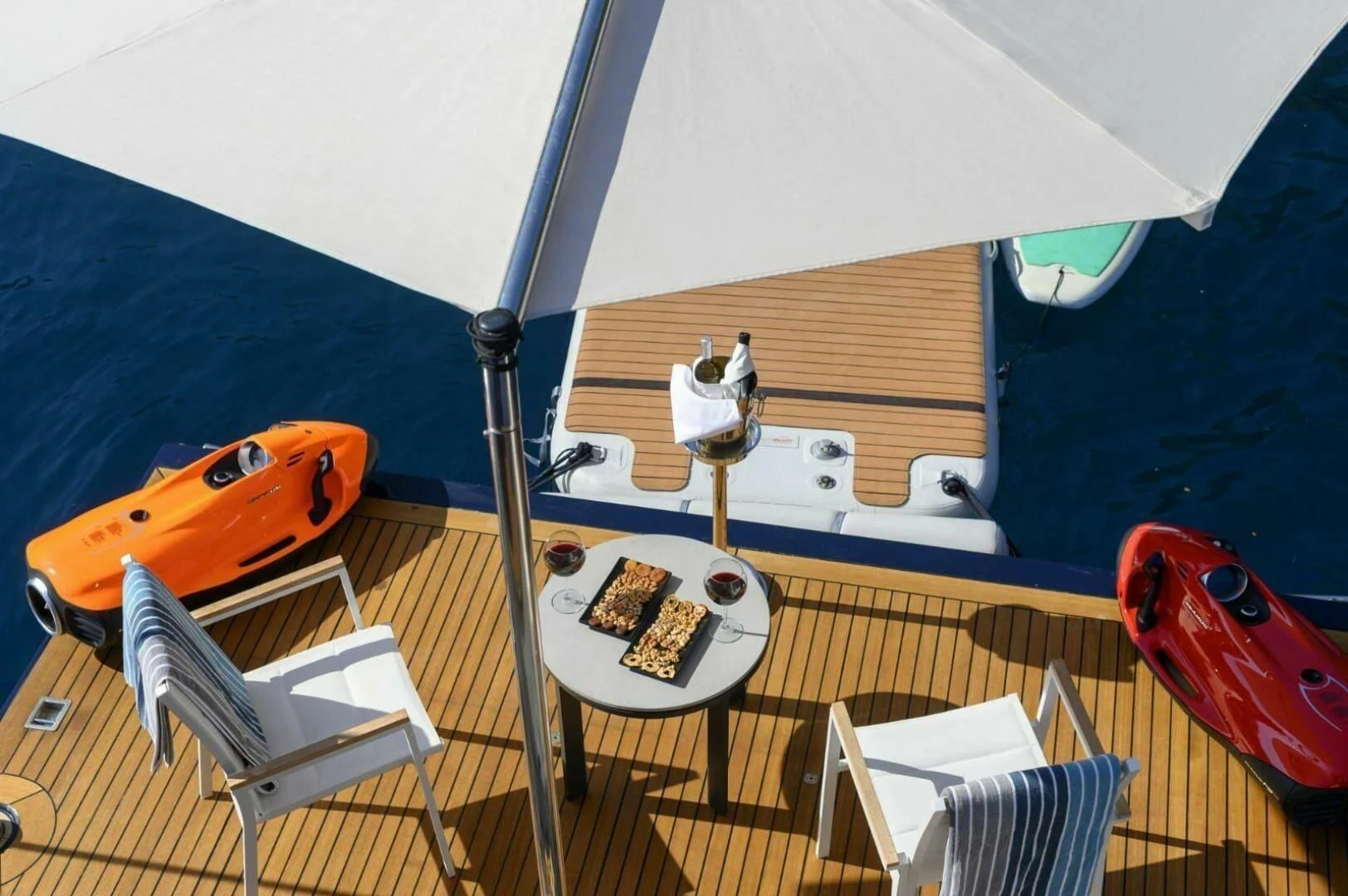 a tent with a table and chairs aboard HAG Yacht for Sale