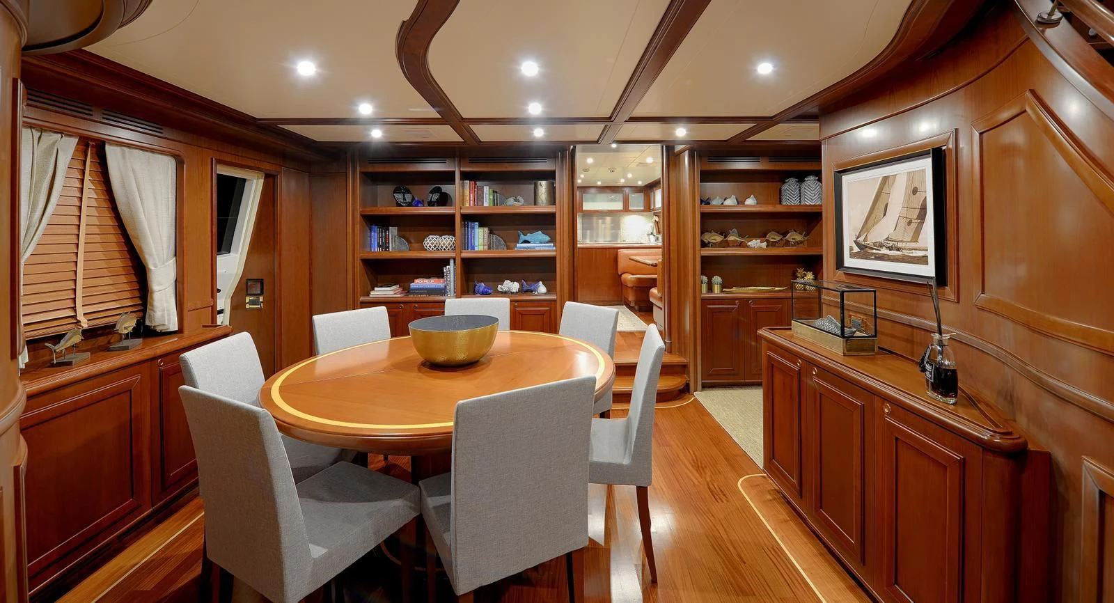 a dining room with a table and chairs aboard HAG Yacht for Sale