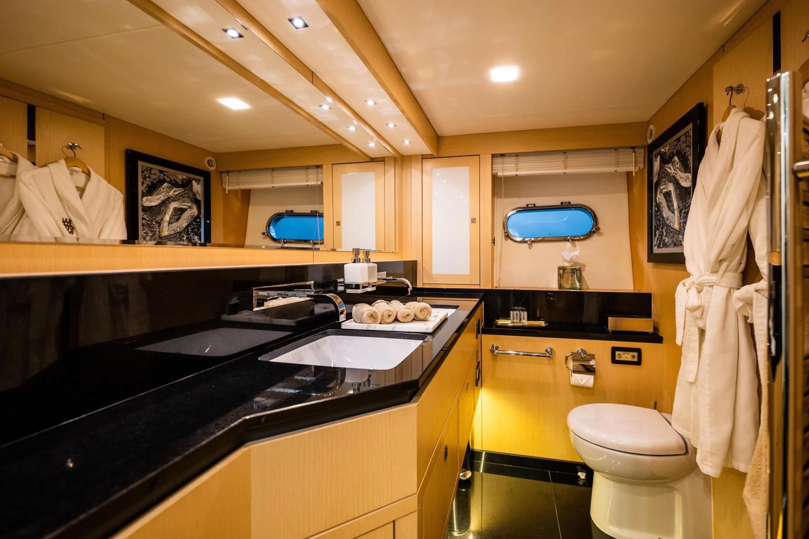 a bathroom with a sink and toilet aboard THE KING Yacht for Sale
