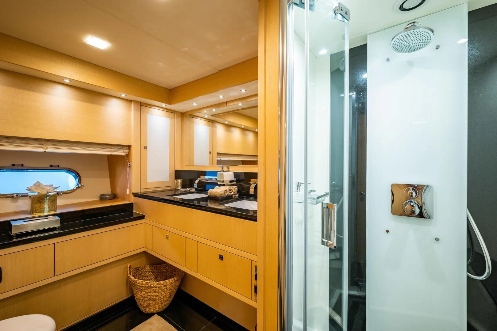 a bathroom with a shower unit and sink aboard THE KING Yacht for Sale