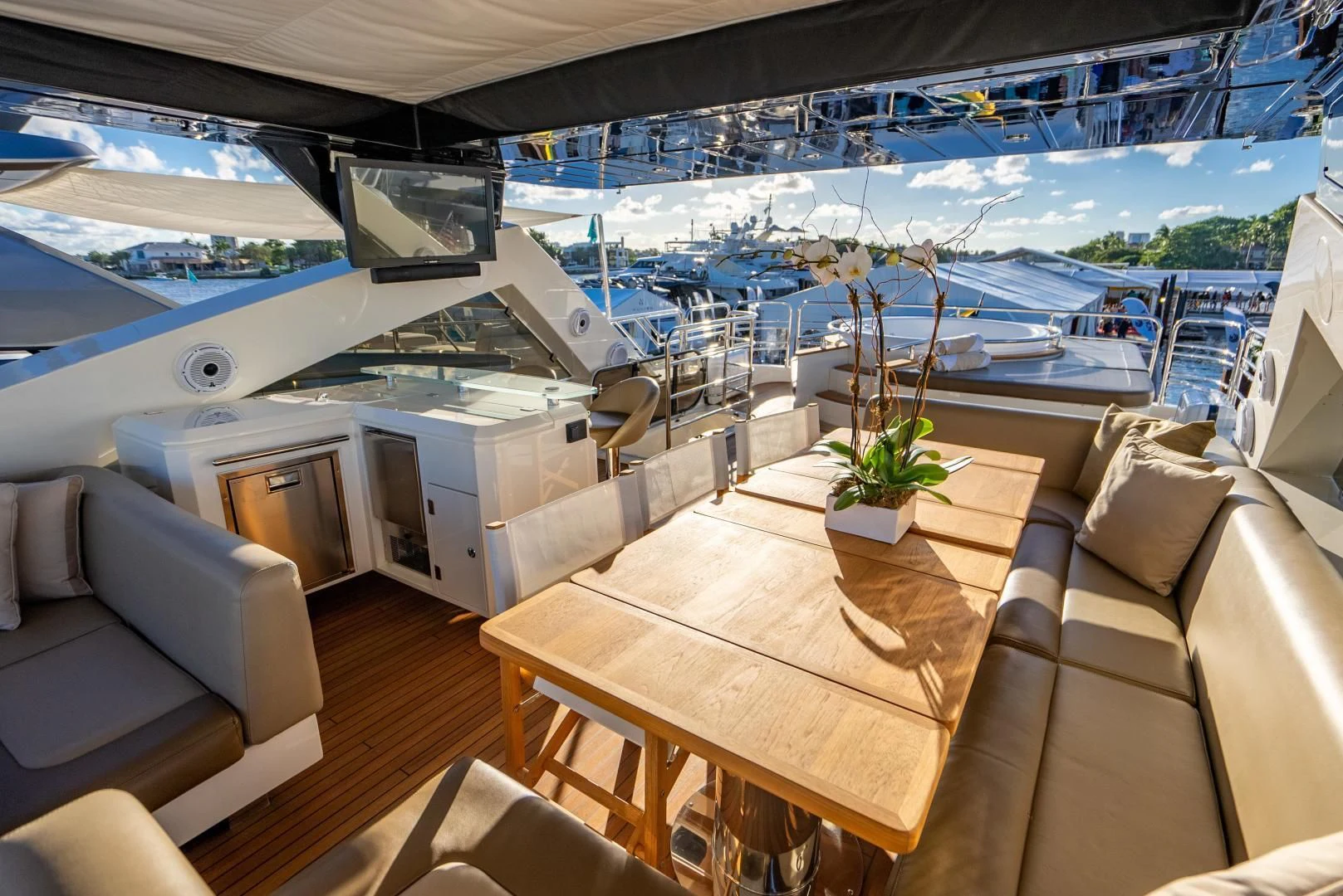 a room with a table and chairs aboard THE KING Yacht for Sale