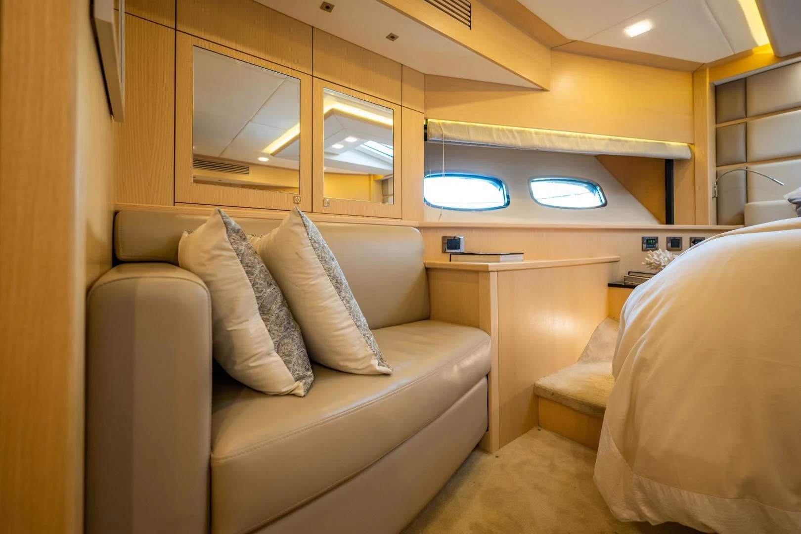 a room with a couch and a desk aboard THE KING Yacht for Sale