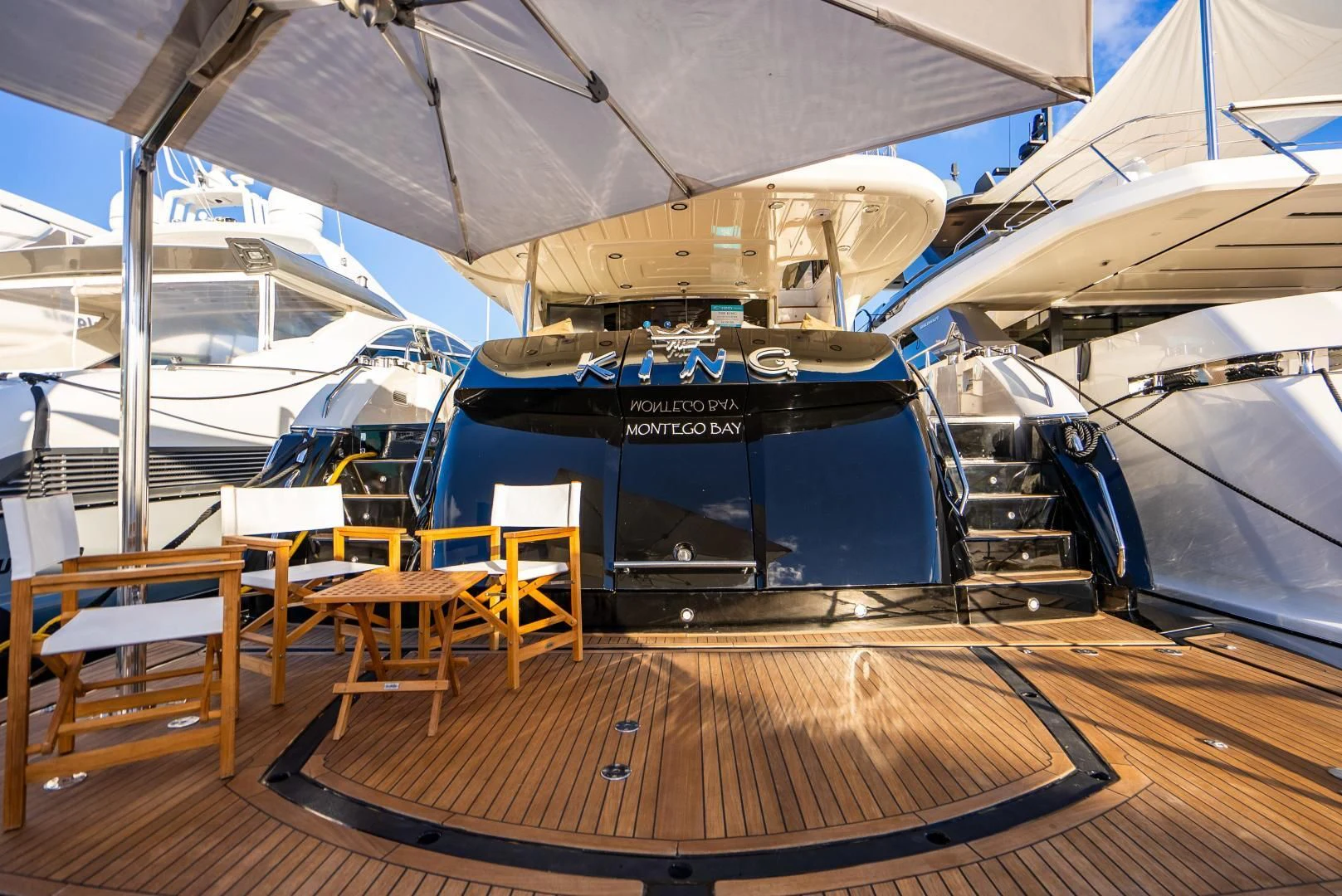 a boat on a deck aboard THE KING Yacht for Sale