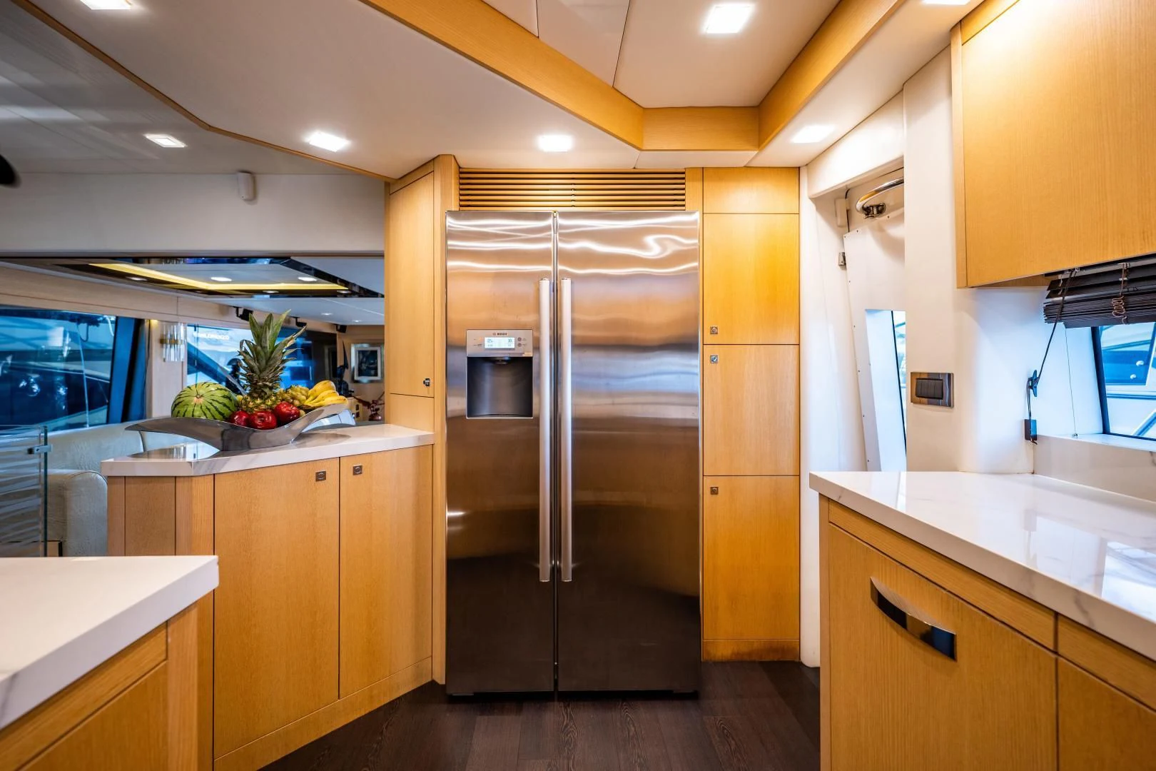 a kitchen with a glass door aboard THE KING Yacht for Sale