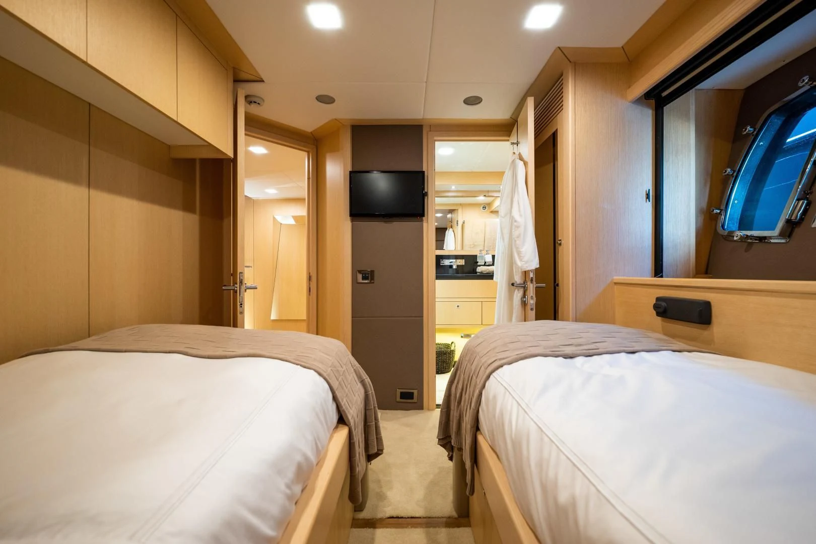 a room with two beds aboard THE KING Yacht for Sale