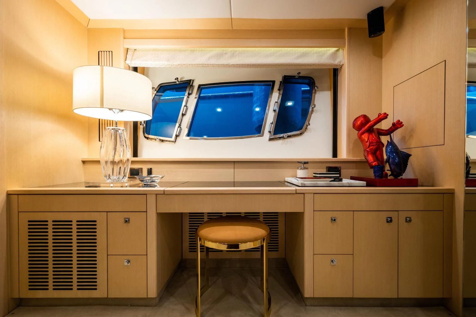 a kitchen with a large window aboard THE KING Yacht for Sale