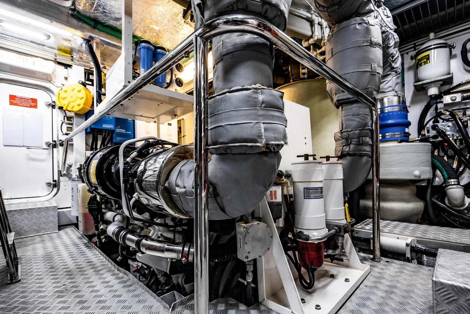 a machine with a large black pipe aboard THE KING Yacht for Sale