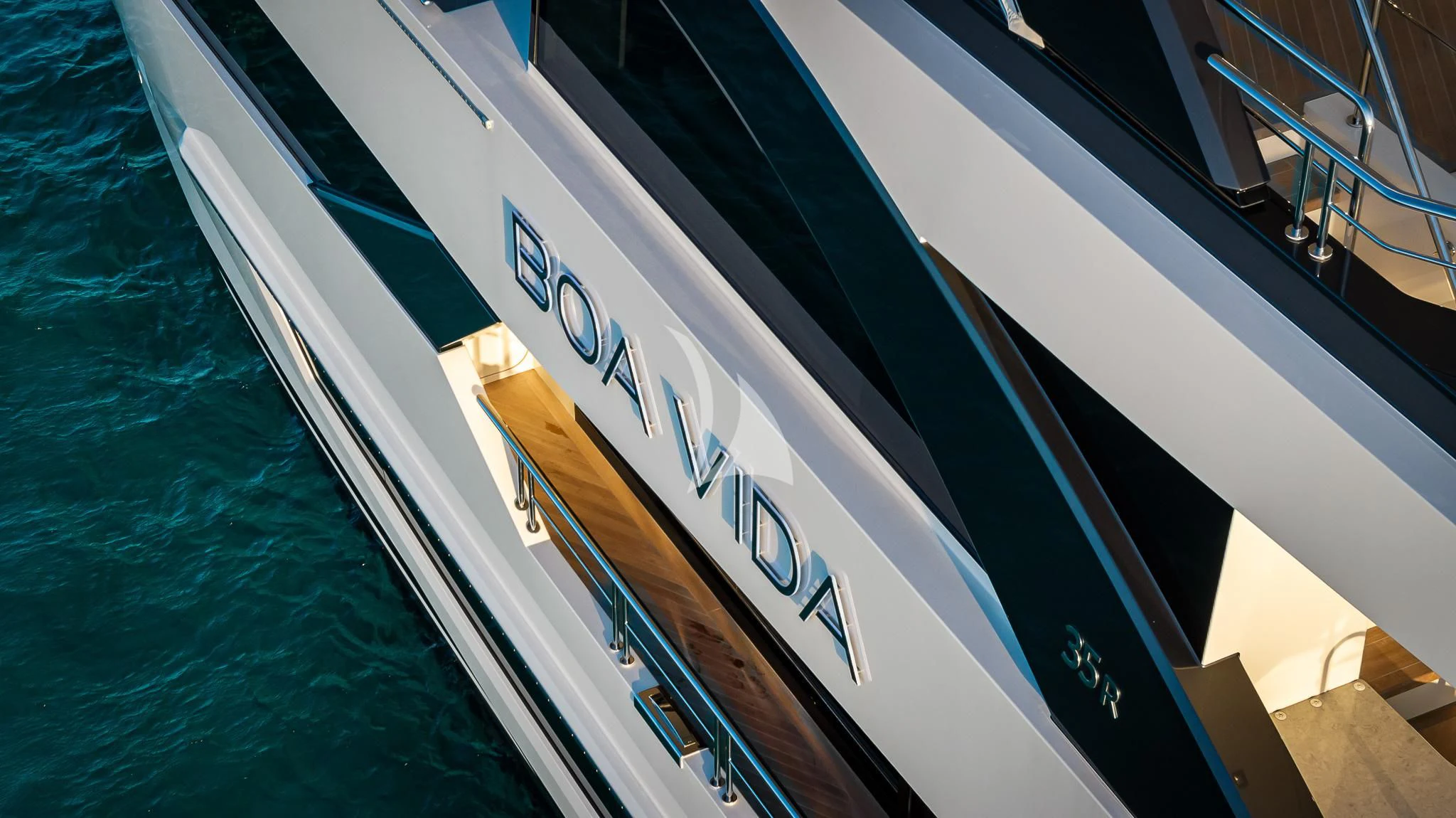 a large boat on the water aboard BOA VIDA Yacht for Sale