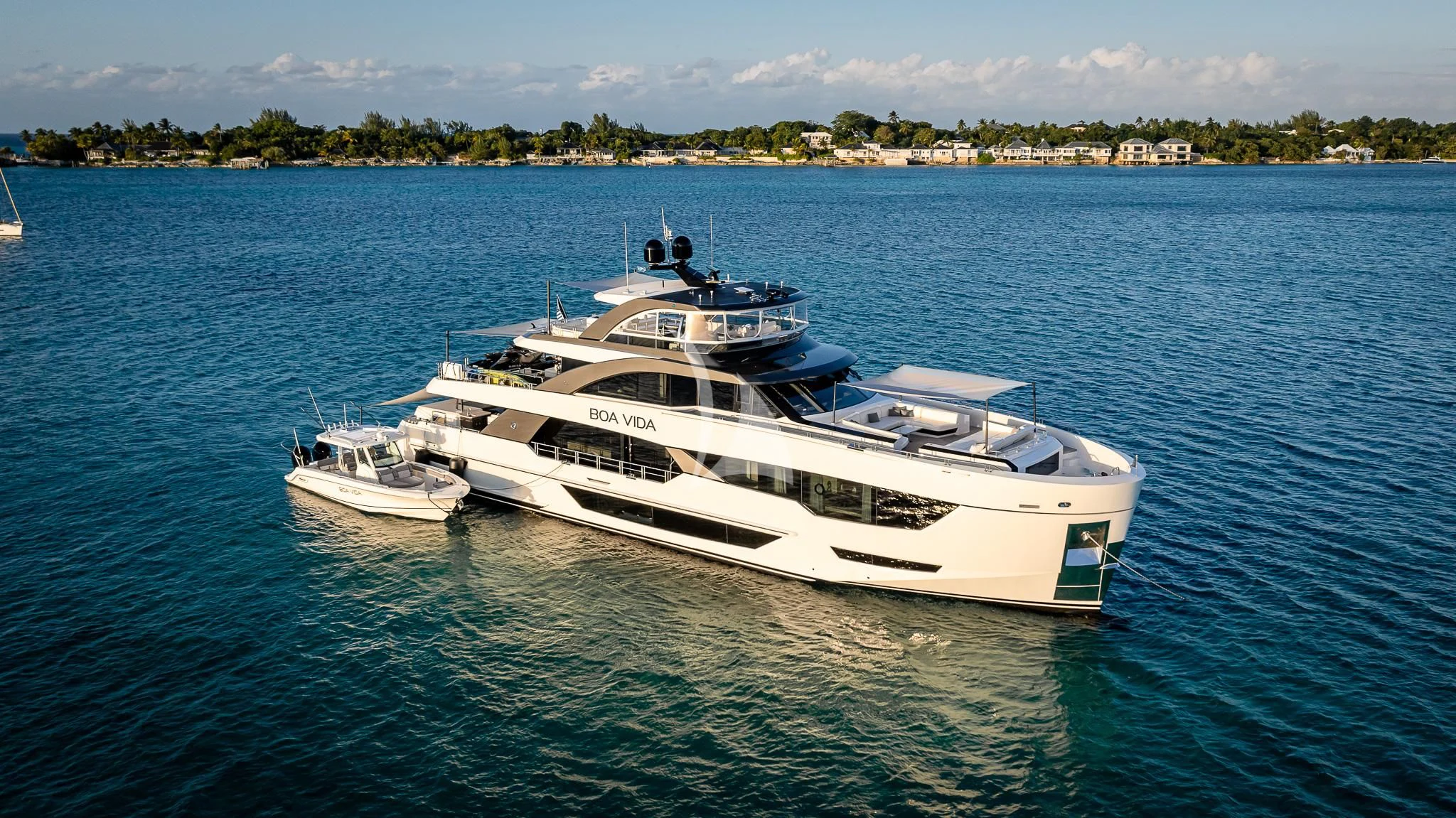 a couple of boats in the water aboard BOA VIDA Yacht for Sale