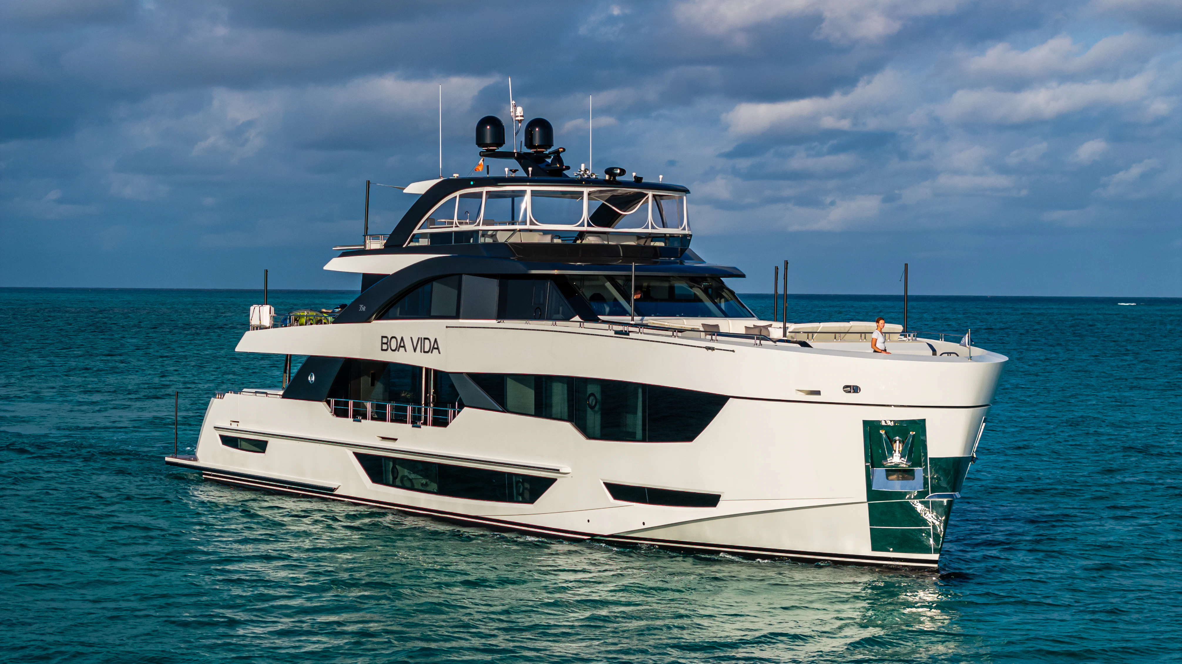 a white boat in the water aboard BOA VIDA Yacht for Sale