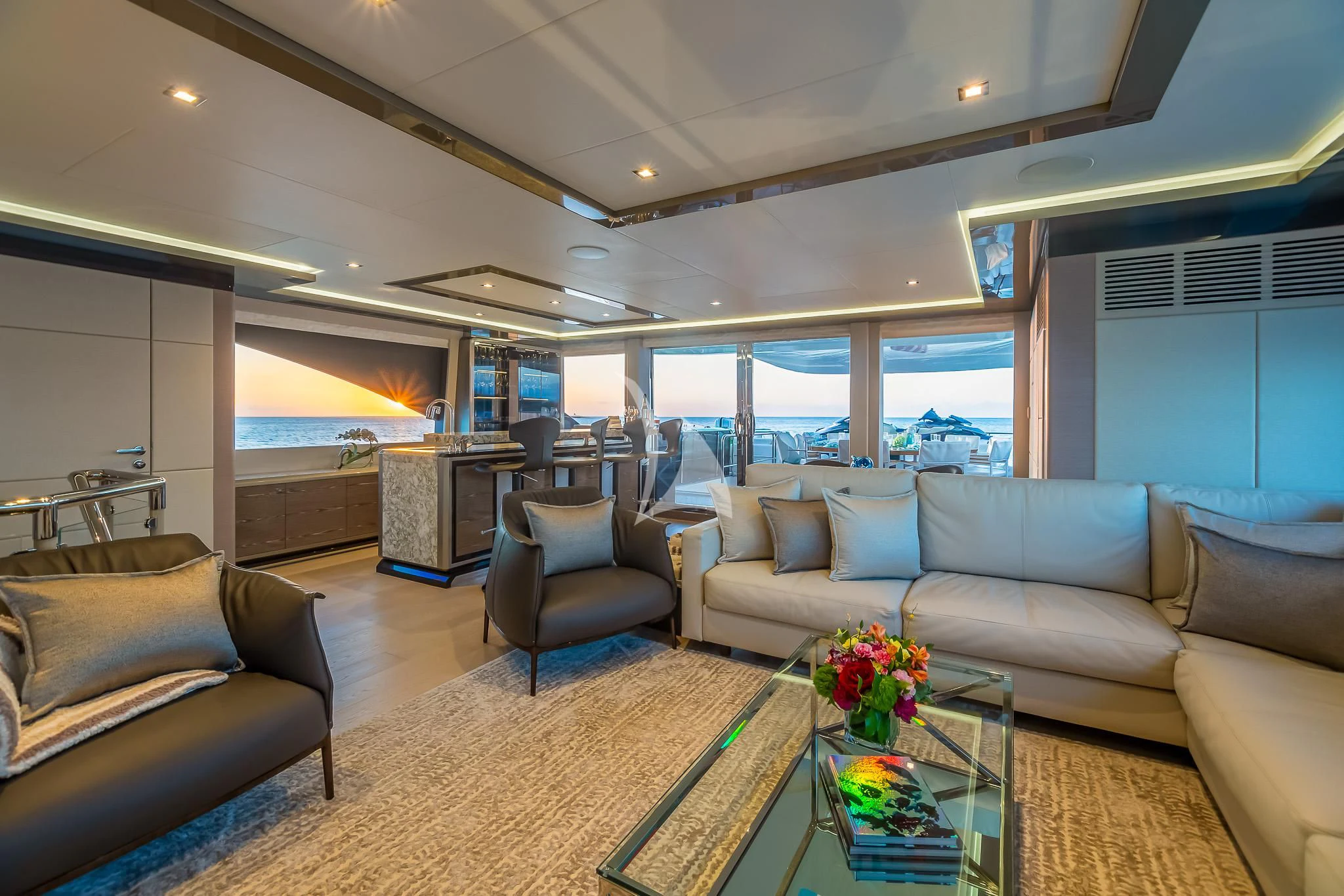 a living room with a large window aboard BOA VIDA Yacht for Sale