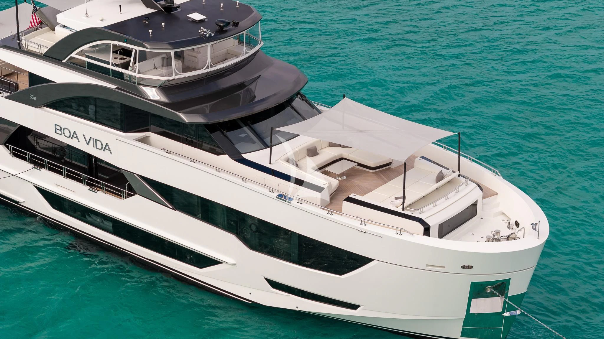 a couple of boats on the water aboard BOA VIDA Yacht for Sale