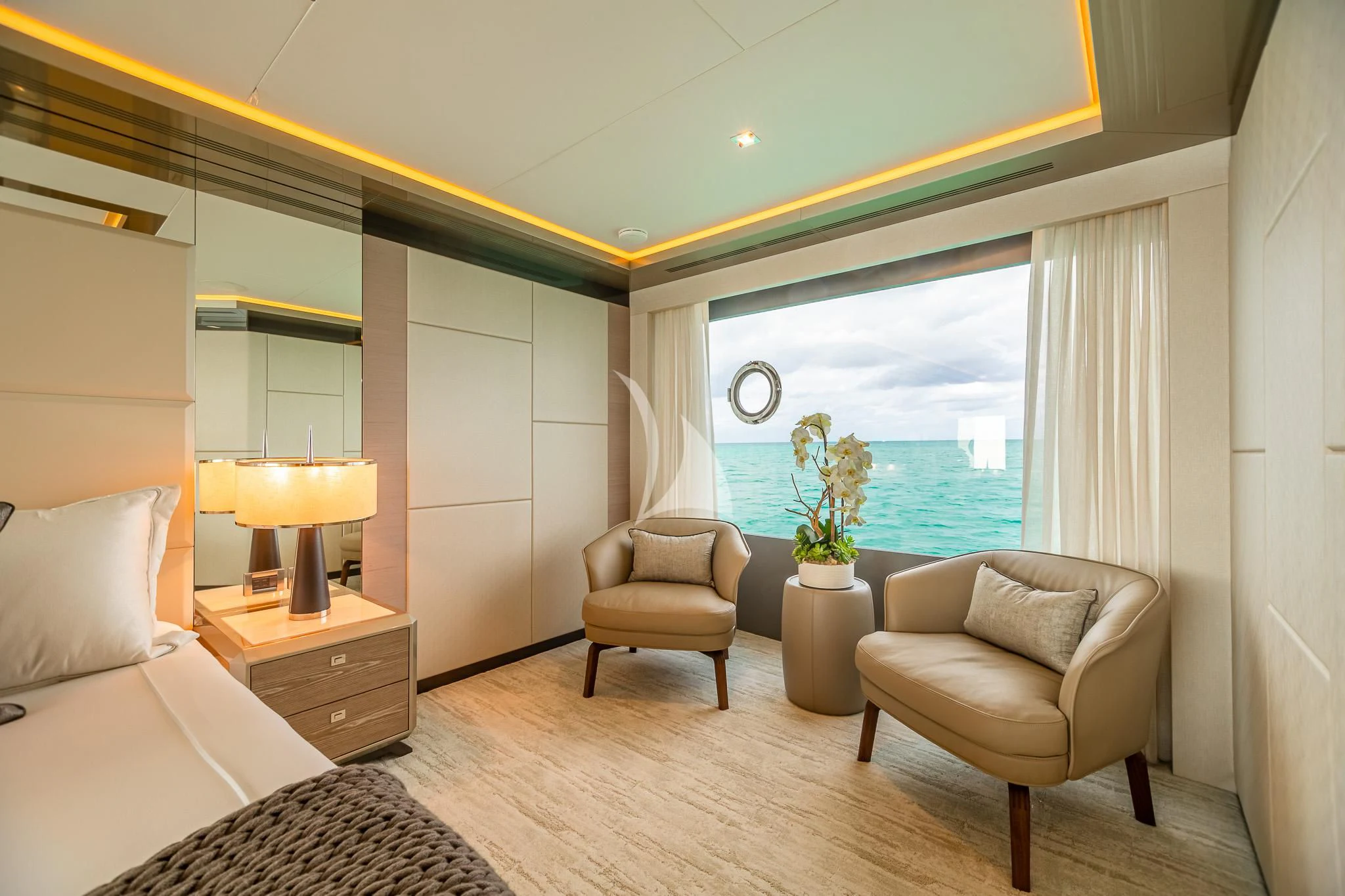 a room with a large window and a view of a city aboard BOA VIDA Yacht for Sale