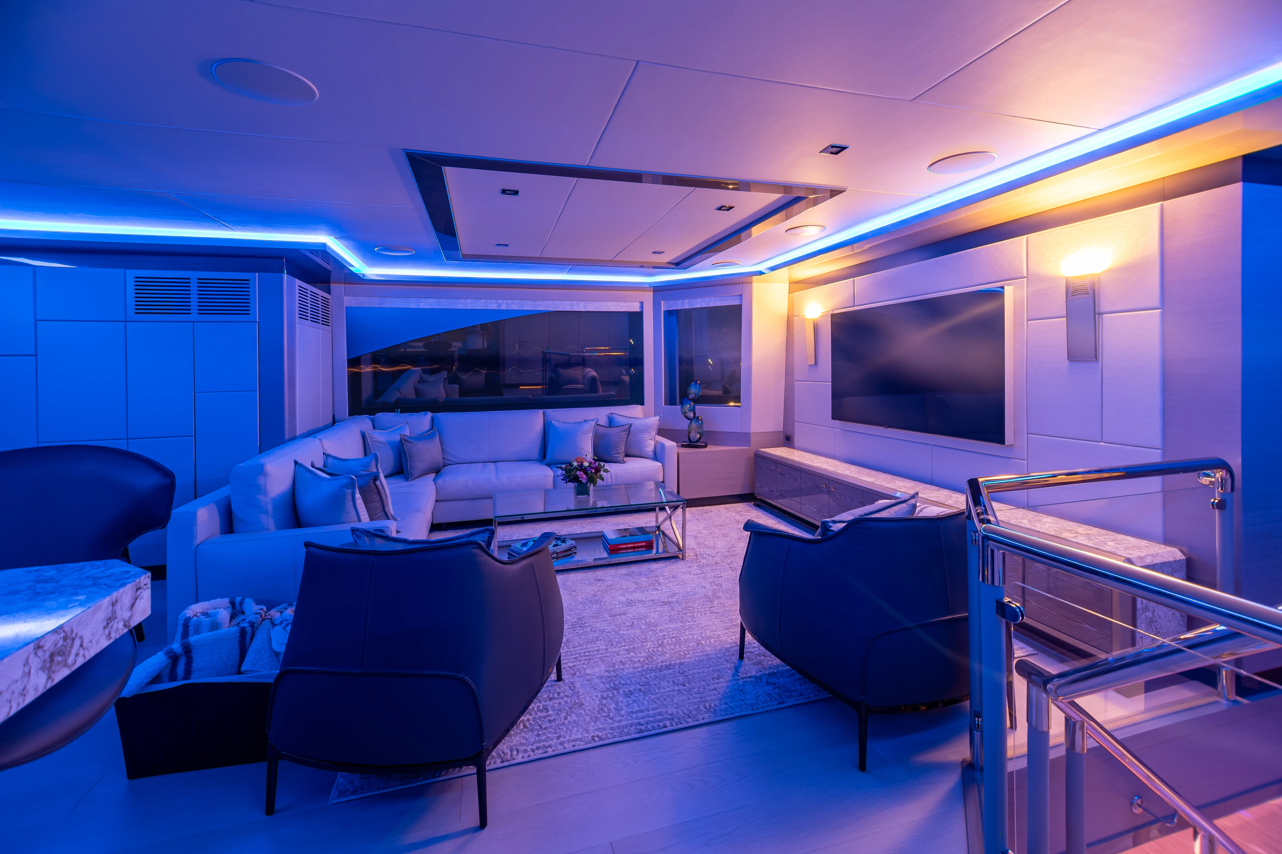 a room with a large screen aboard BOA VIDA Yacht for Sale