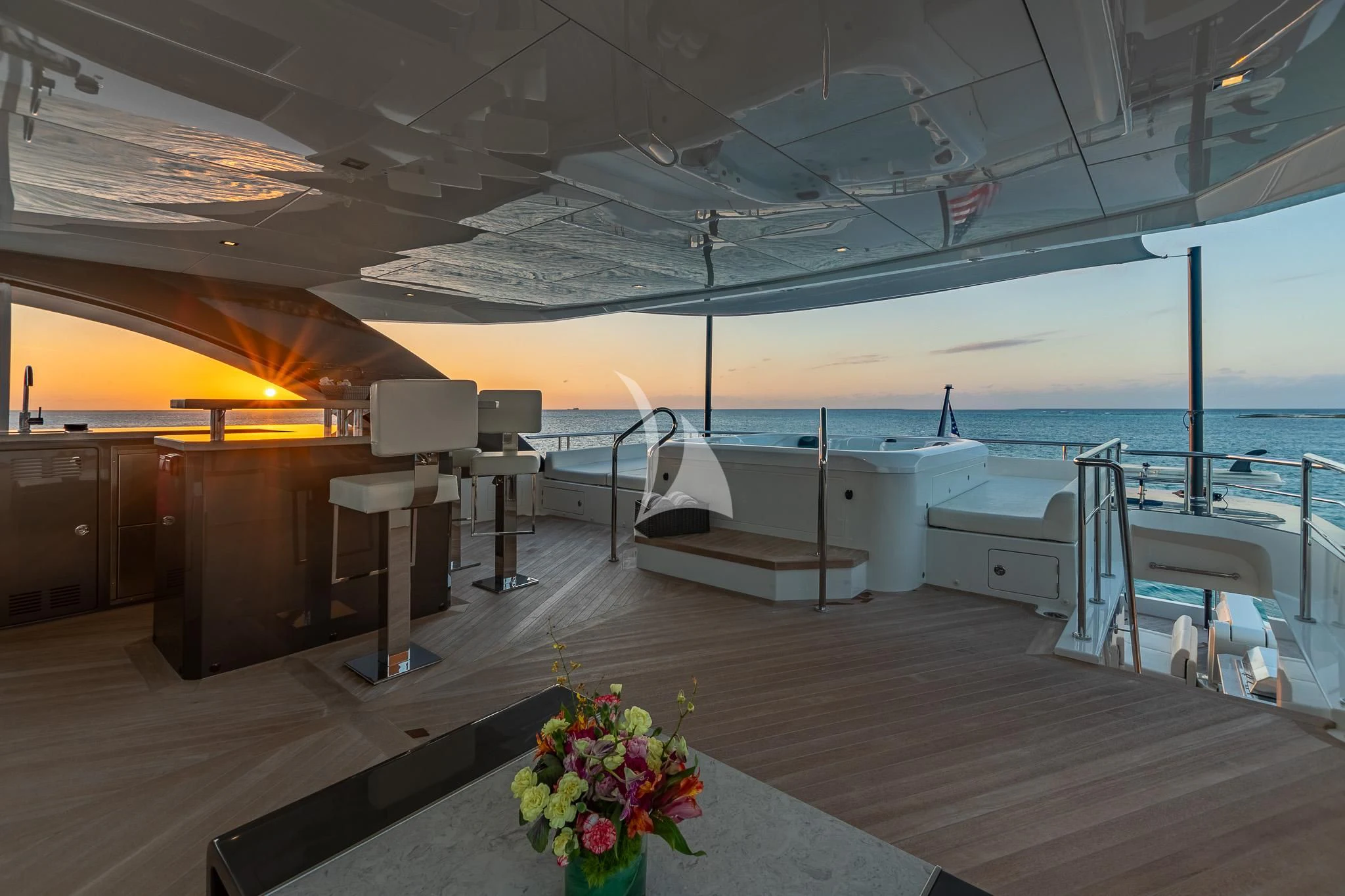 a room with a table and chairs aboard BOA VIDA Yacht for Sale