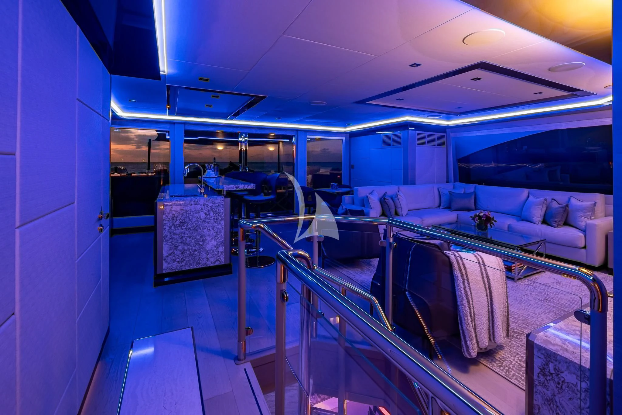 inside of a room with a couch and a table aboard BOA VIDA Yacht for Sale