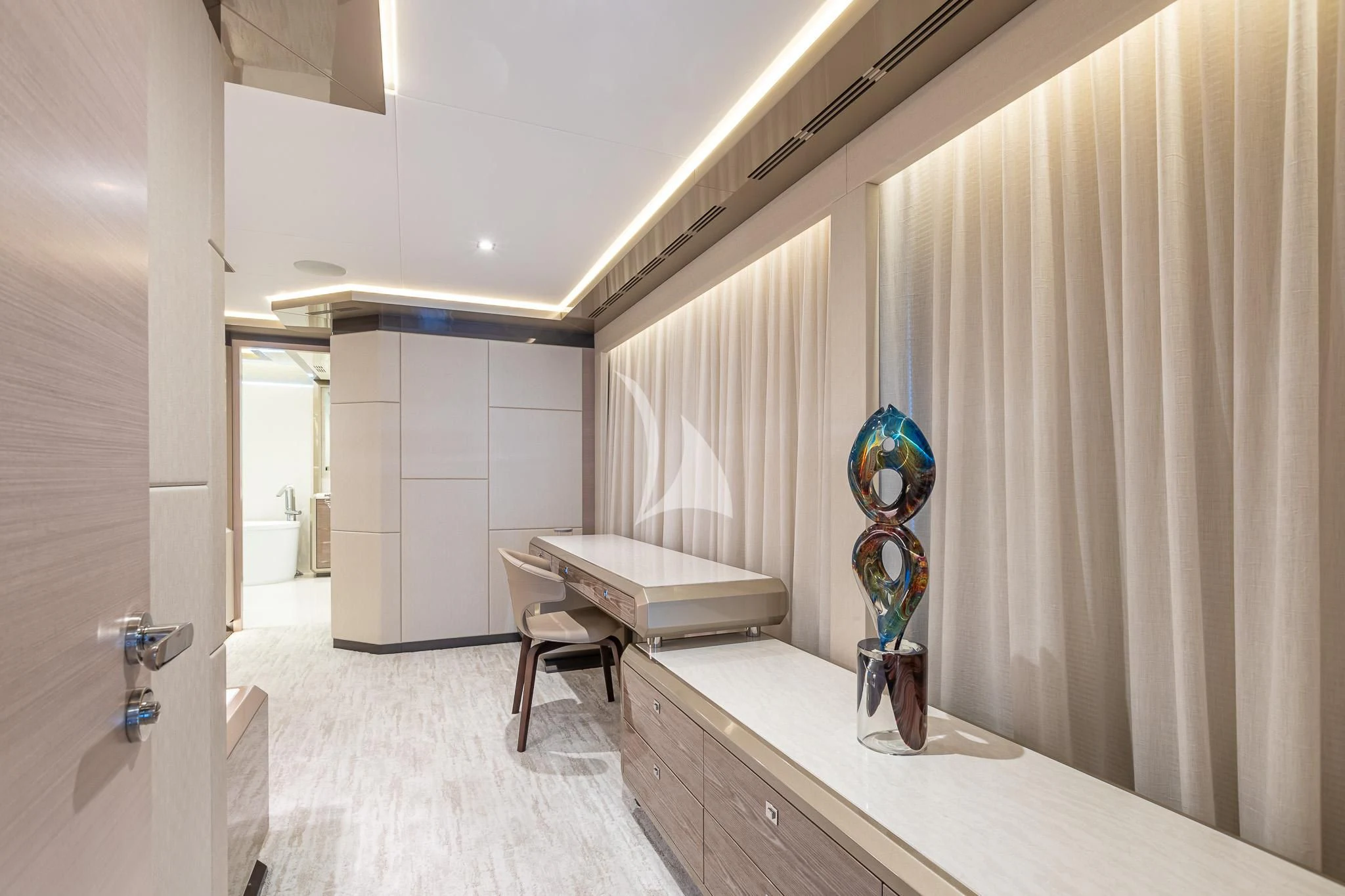 a room with a desk and a shower curtain aboard BOA VIDA Yacht for Sale