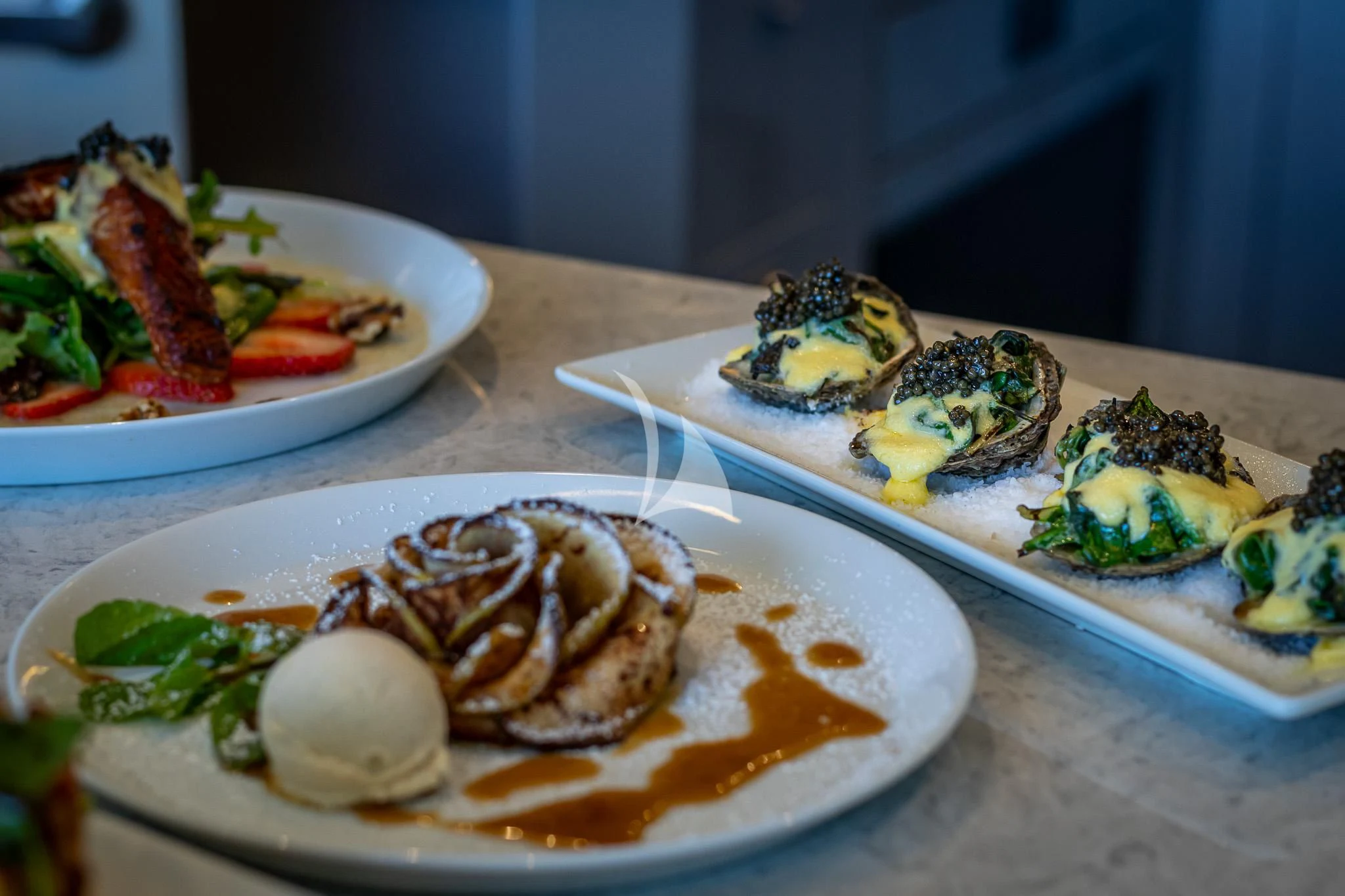 plates of food on a table aboard BOA VIDA Yacht for Sale