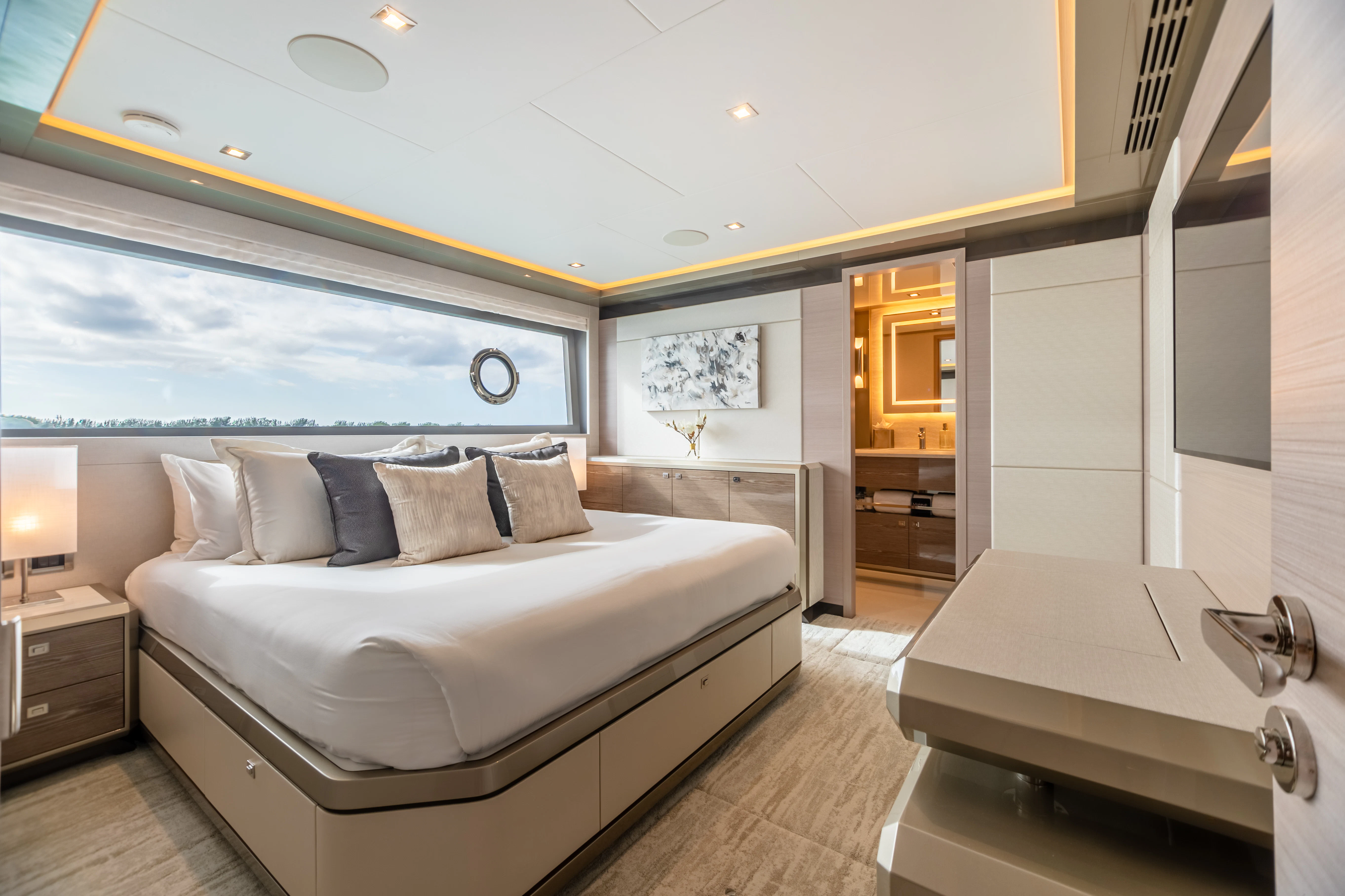 a large bedroom with a large bed aboard BOA VIDA Yacht for Sale