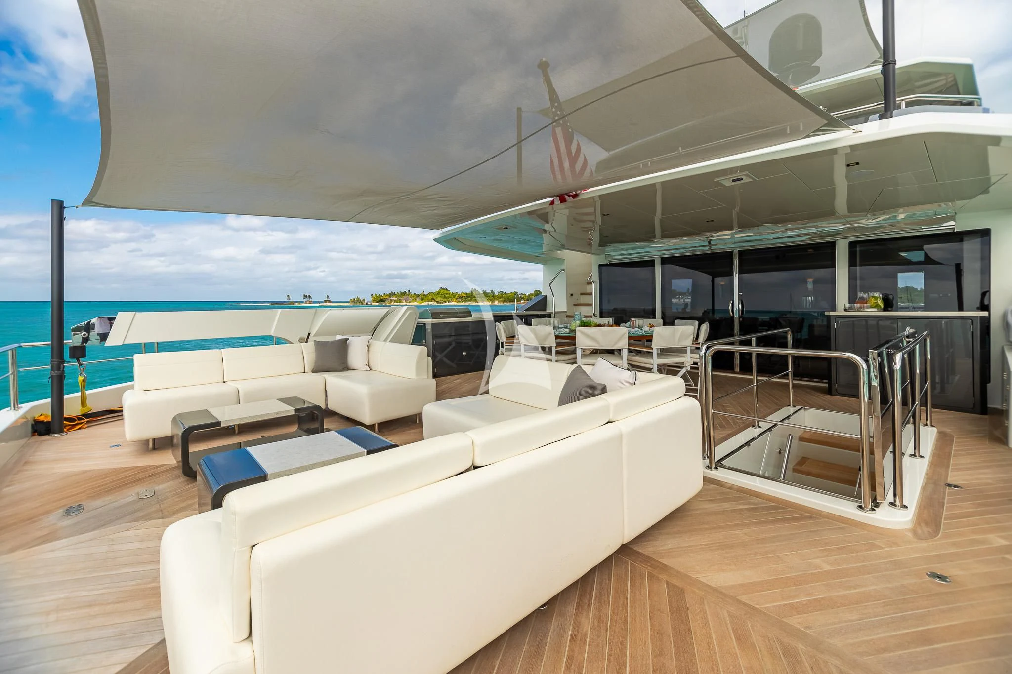 a large lounge area with a pool aboard BOA VIDA Yacht for Sale