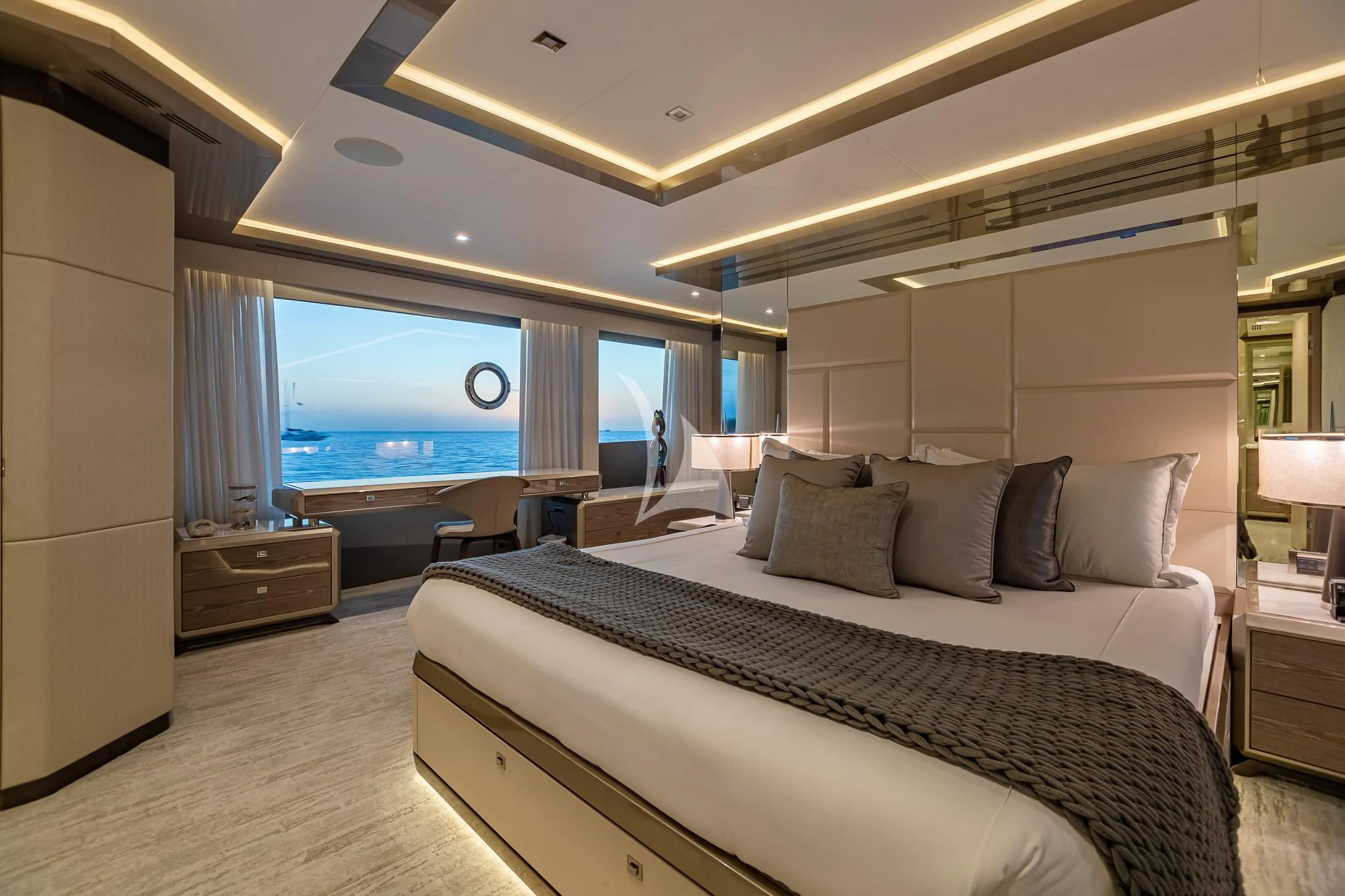 a large bed in a room aboard BOA VIDA Yacht for Sale