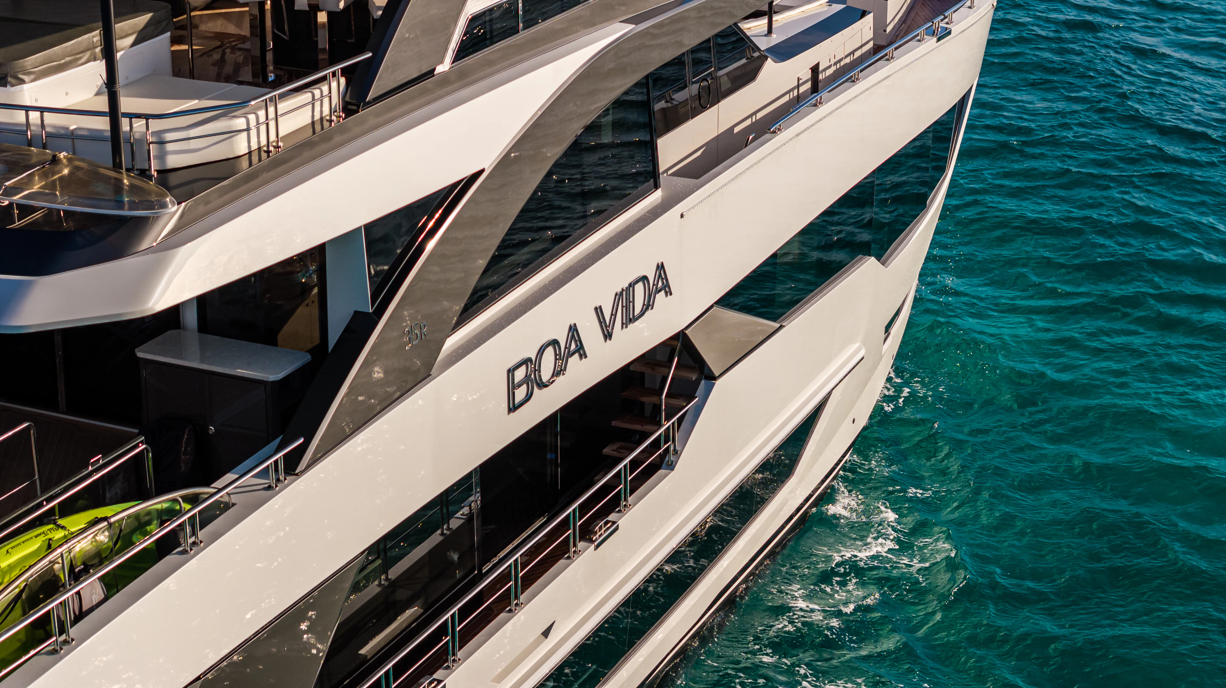 a large white boat on the water aboard BOA VIDA Yacht for Sale