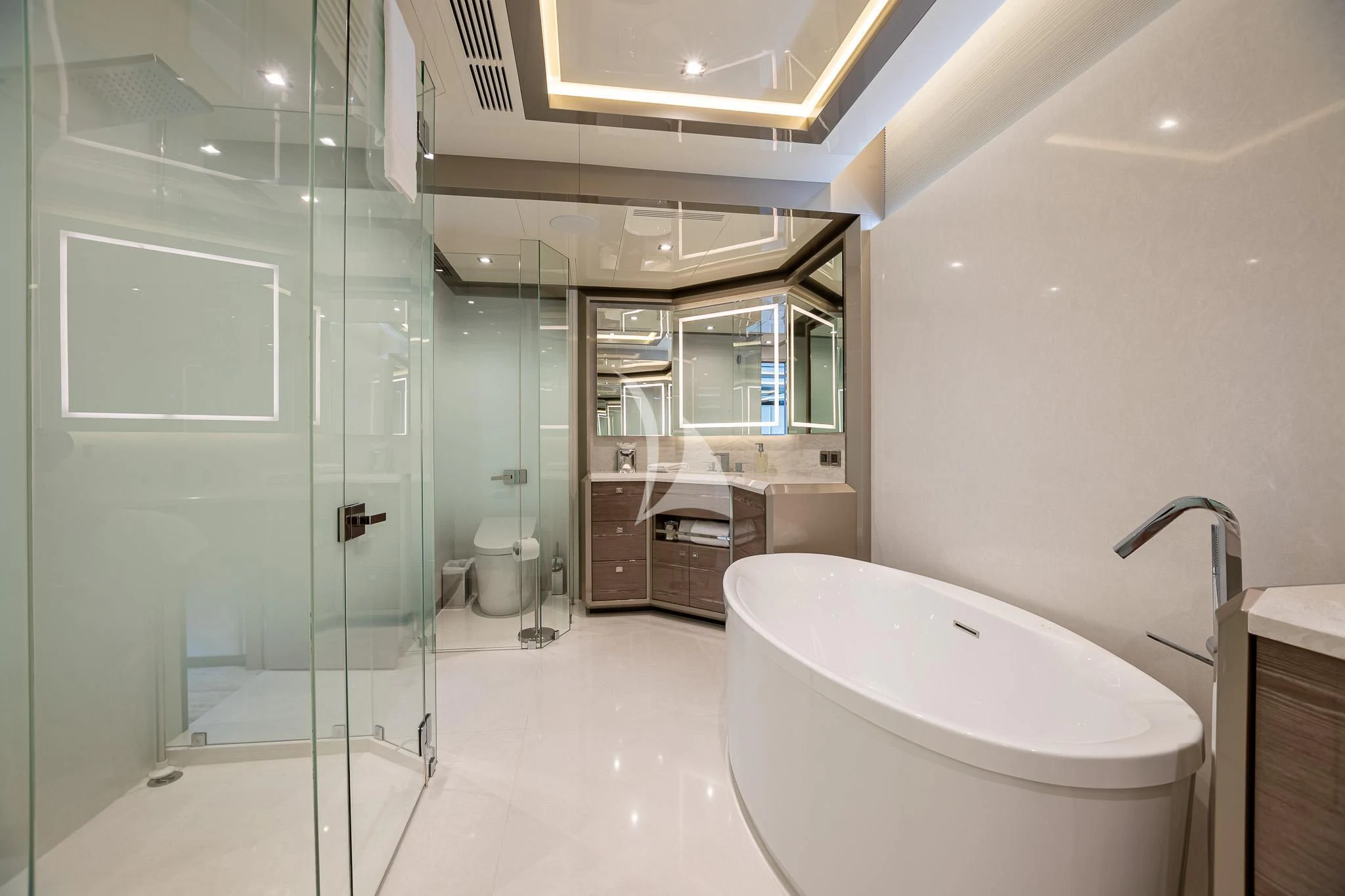 a bathroom with a glass shower aboard BOA VIDA Yacht for Sale