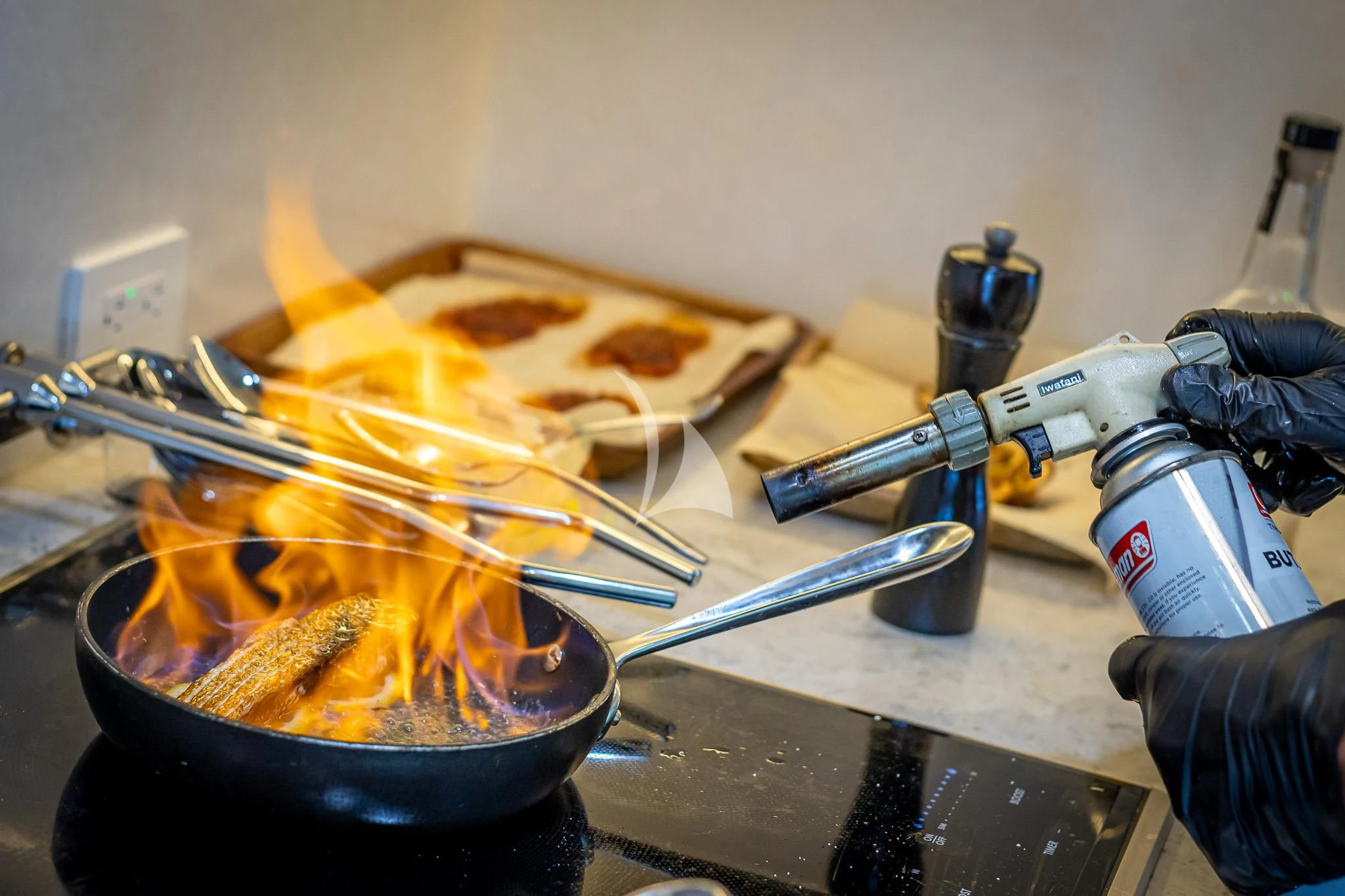 a couple of pans of food aboard BOA VIDA Yacht for Sale