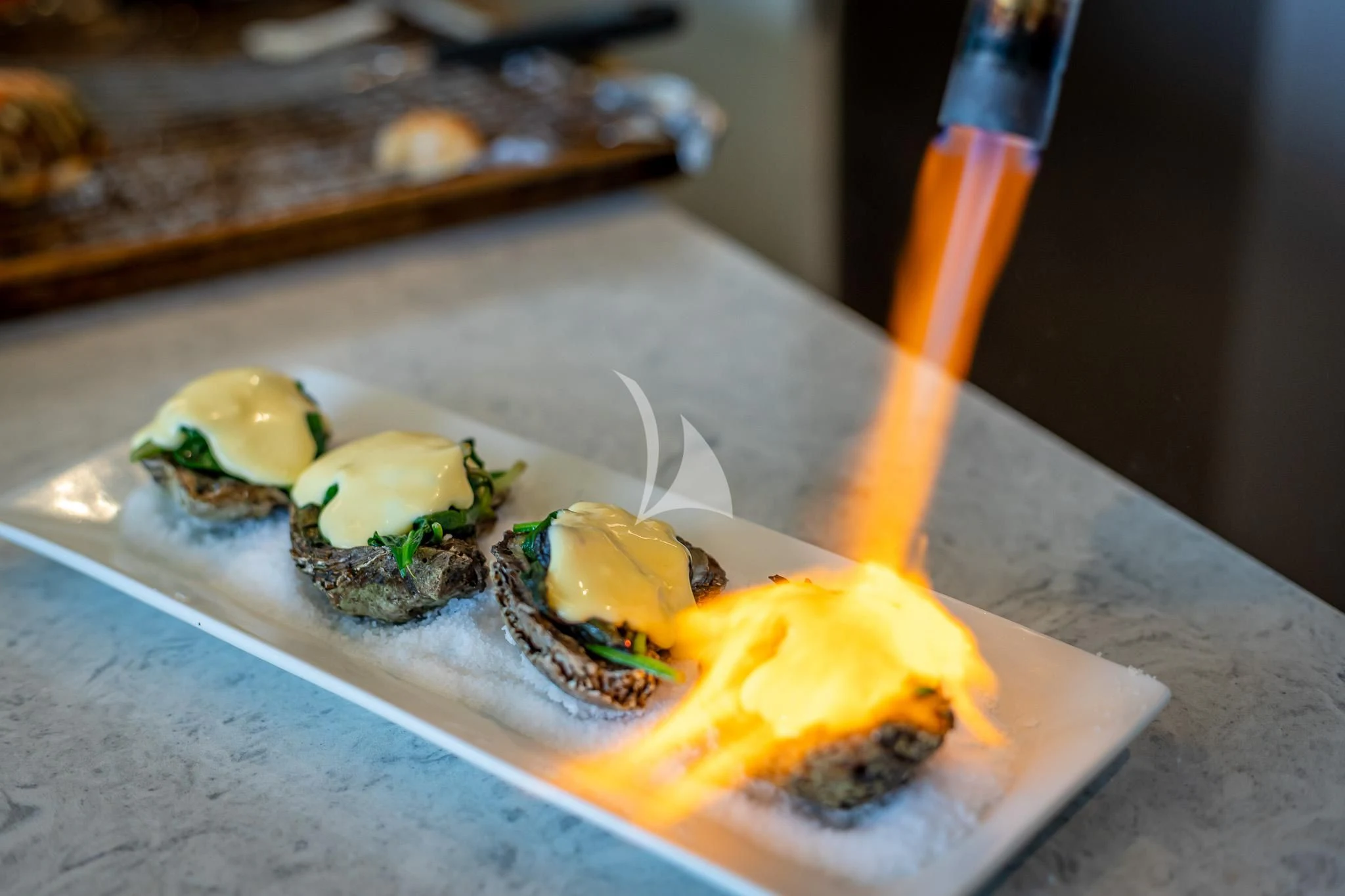 a plate of food aboard BOA VIDA Yacht for Sale