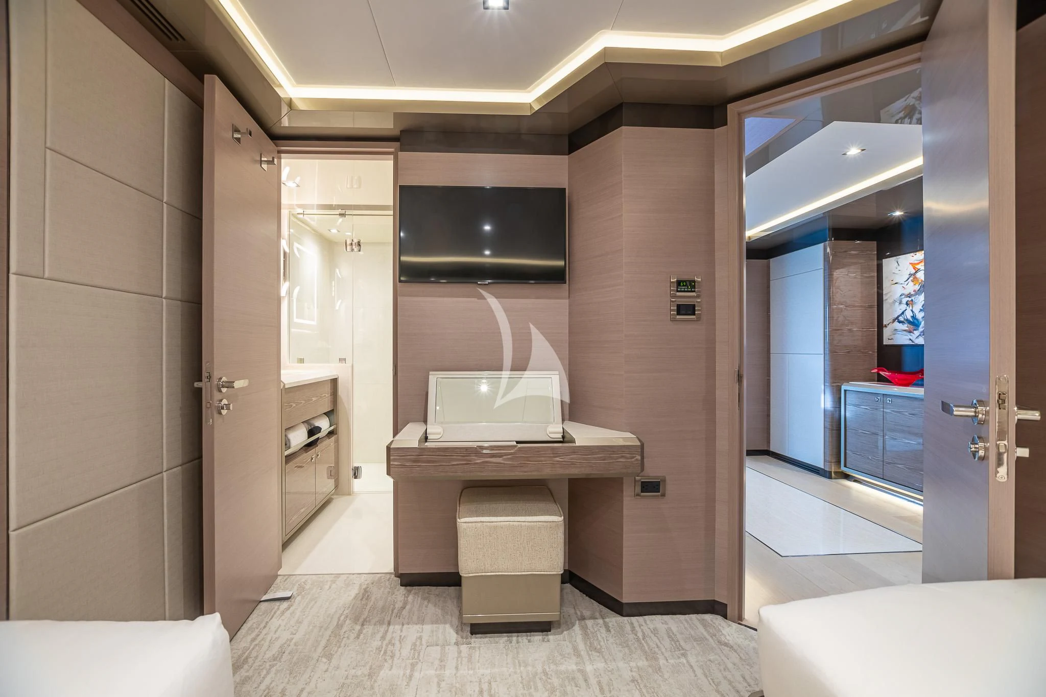 a room with a desk and a computer aboard BOA VIDA Yacht for Sale