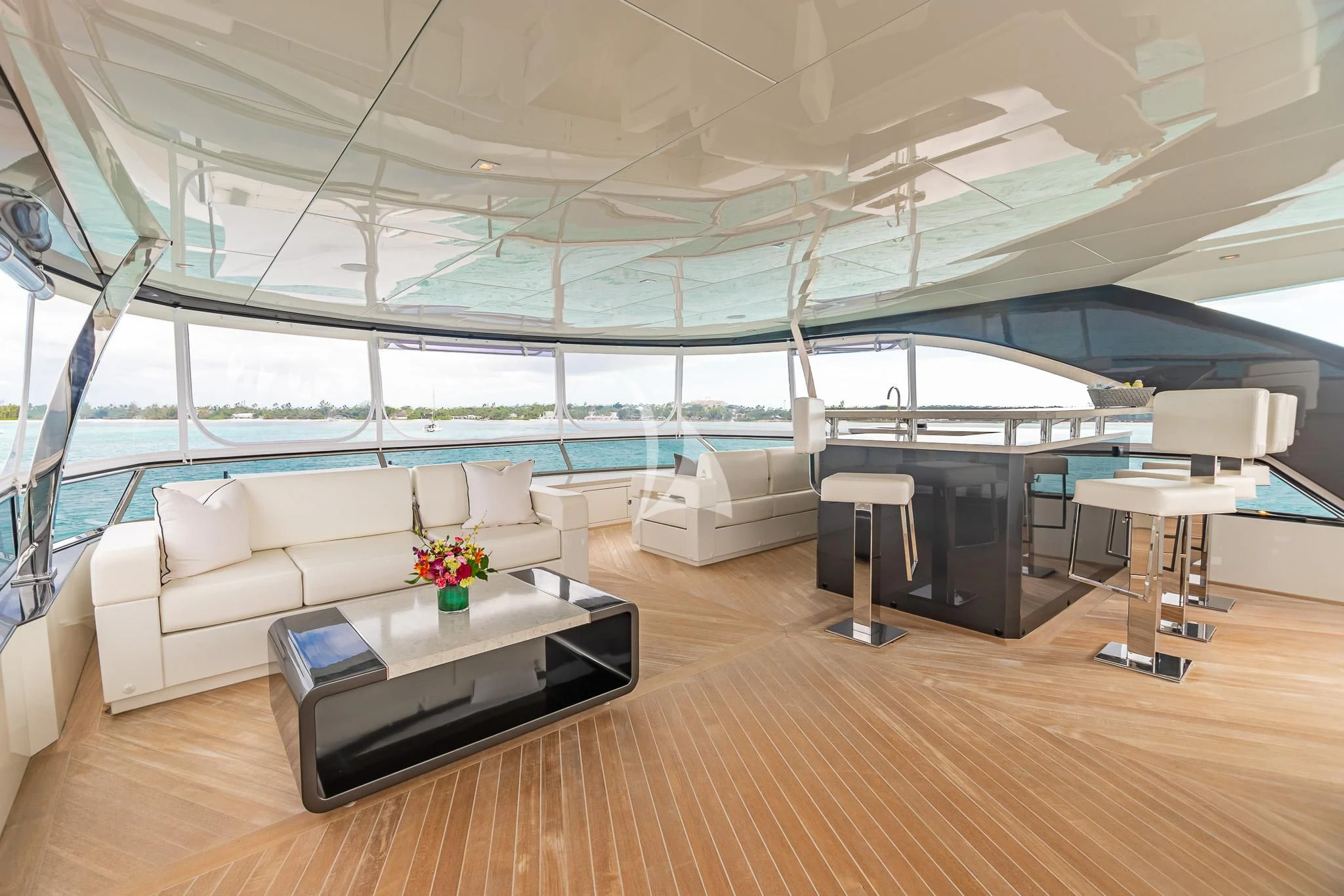 a room with a couch and a table aboard BOA VIDA Yacht for Sale