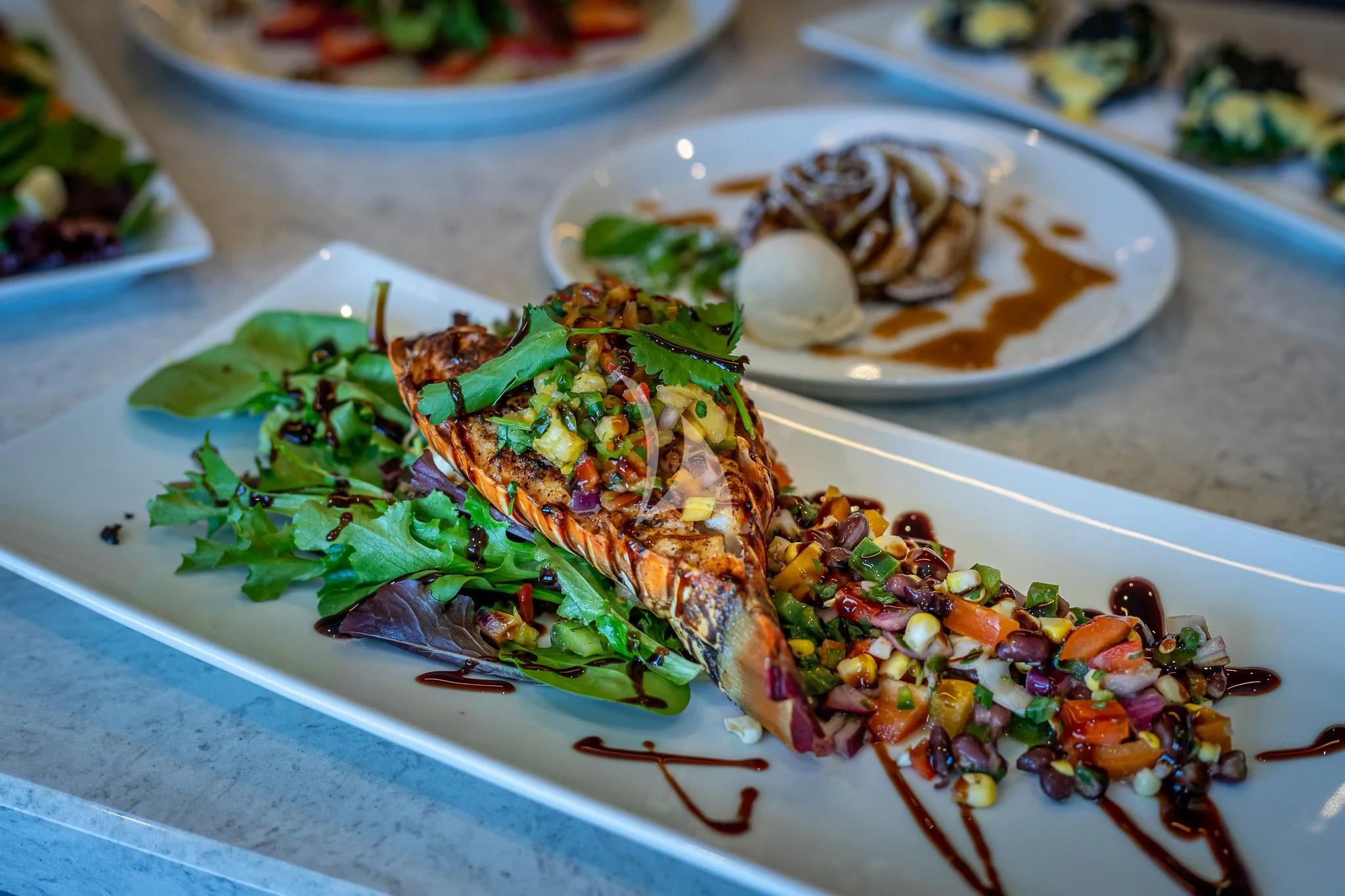 a plate of food aboard BOA VIDA Yacht for Sale