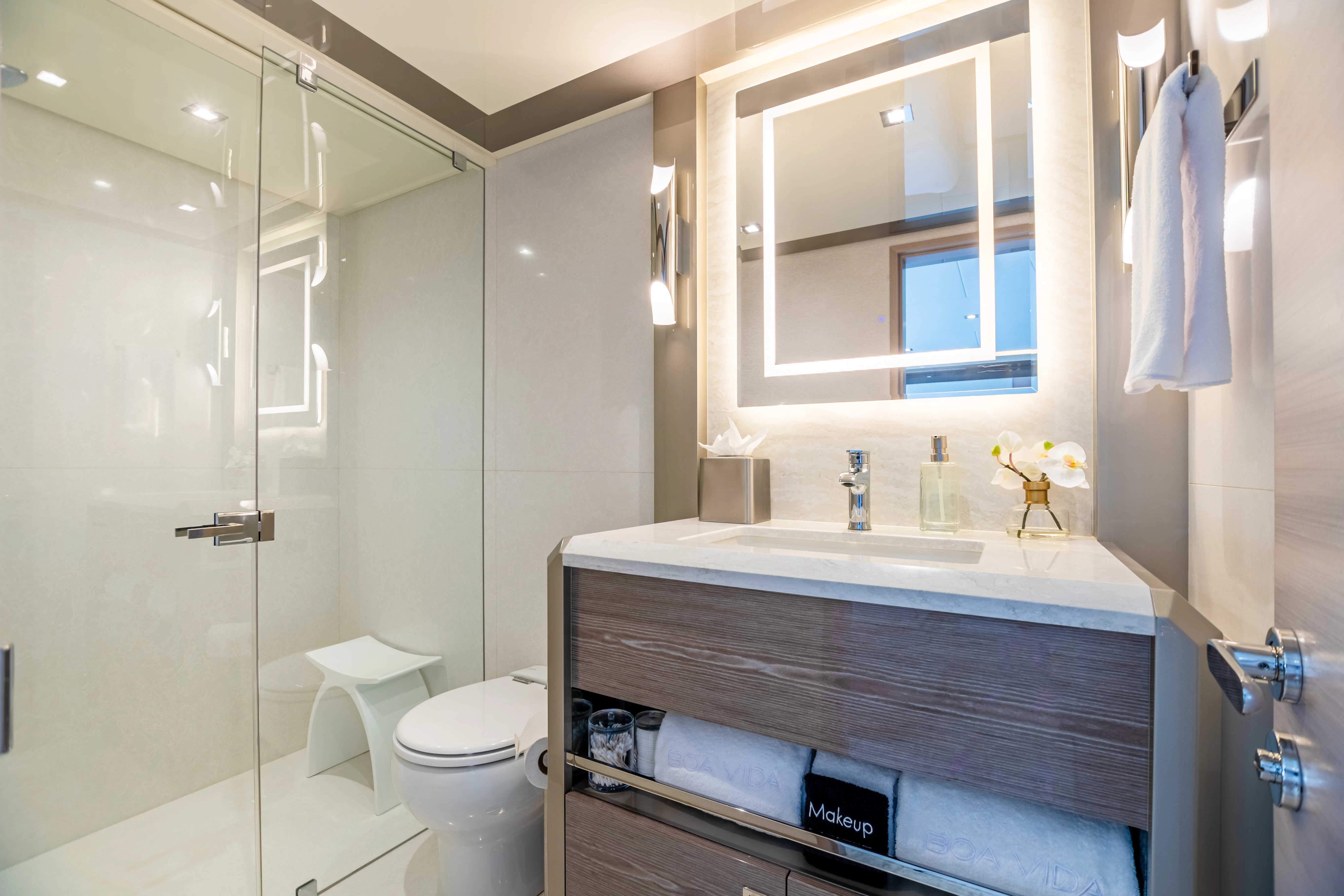 a bathroom with a sink toilet and a bathtub aboard BOA VIDA Yacht for Sale