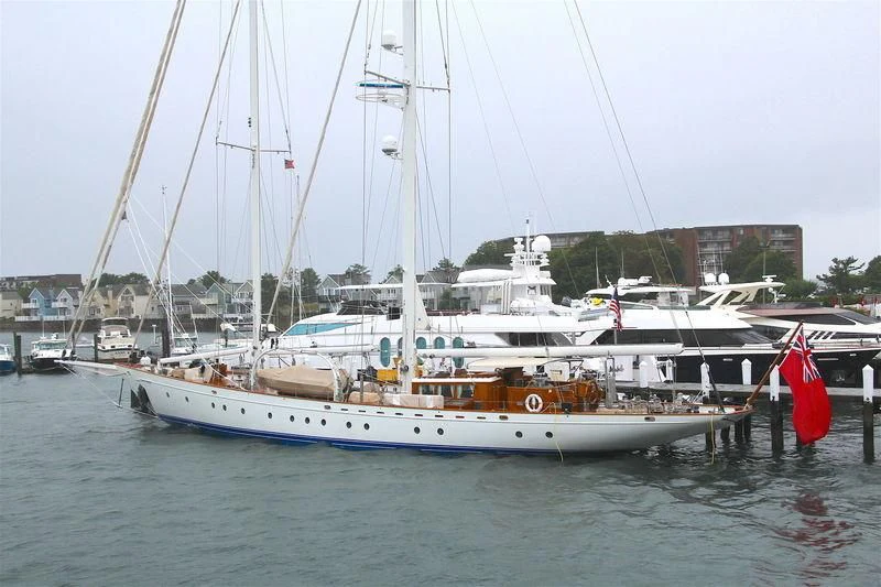 a boat docked at a pier aboard GLORIA Yacht for Sale