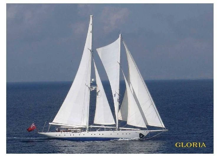 a sailboat in the water aboard GLORIA Yacht for Sale