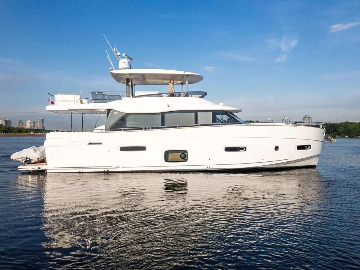 a white yacht on the water aboard MAGELLANO 66 Yacht for Sale