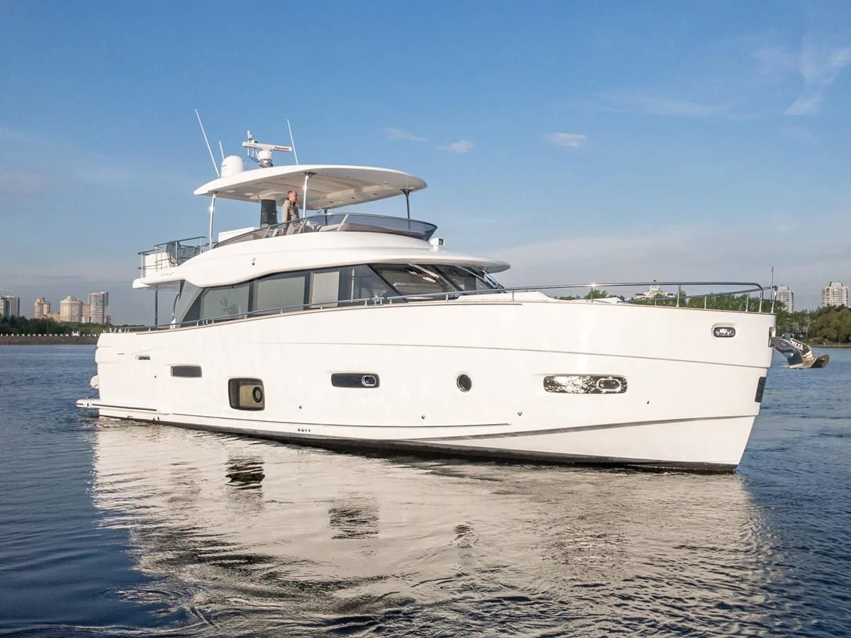 a white yacht on the water aboard MAGELLANO 66 Yacht for Sale