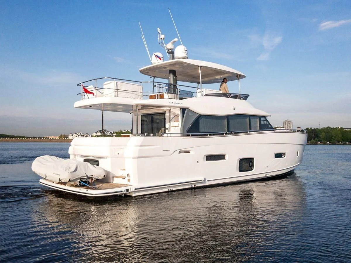 a couple of boats on the water aboard MAGELLANO 66 Yacht for Sale