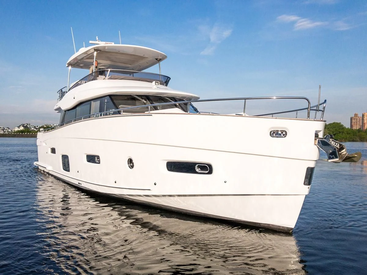 a white yacht on the water aboard MAGELLANO 66 Yacht for Sale