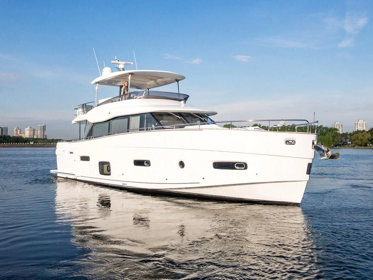 a white yacht on the water aboard MAGELLANO 66 Yacht for Sale
