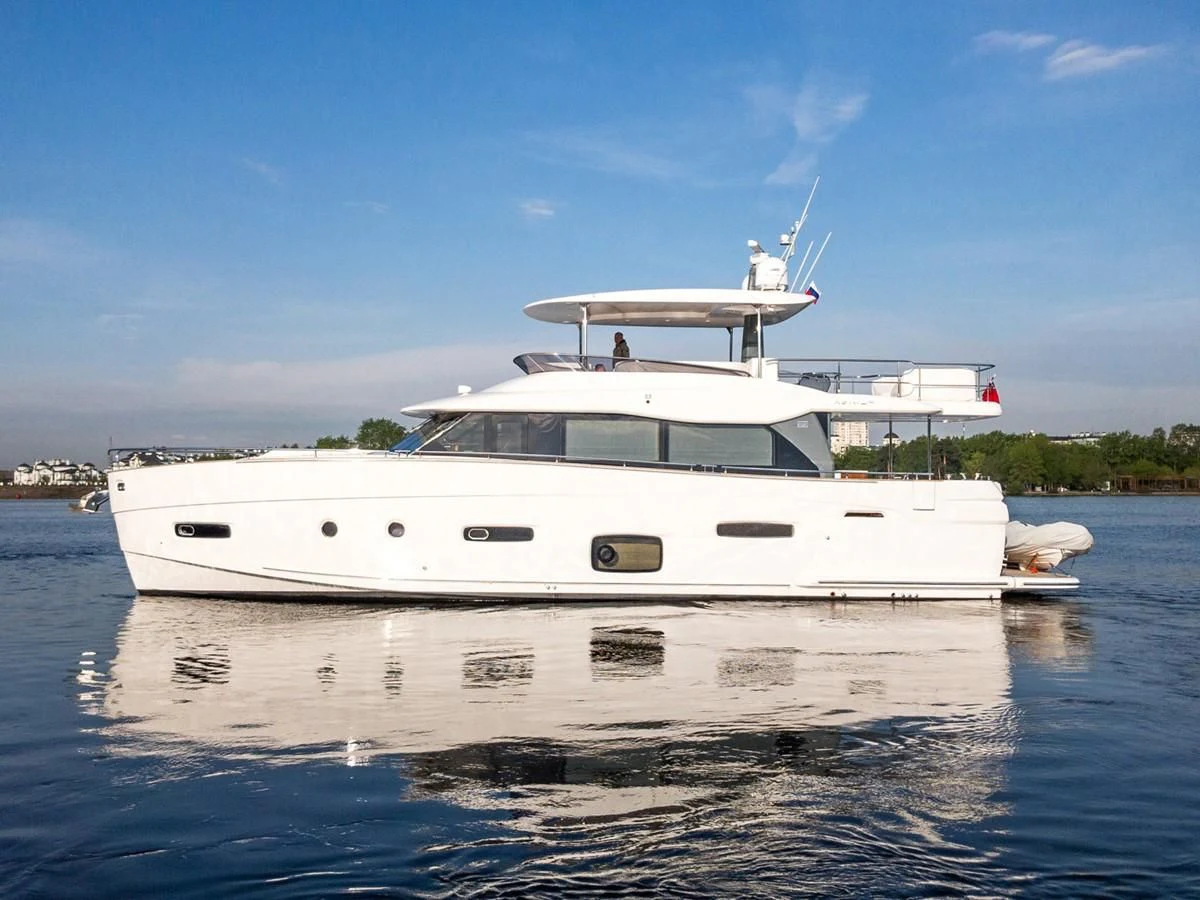 a white yacht on the water aboard MAGELLANO 66 Yacht for Sale