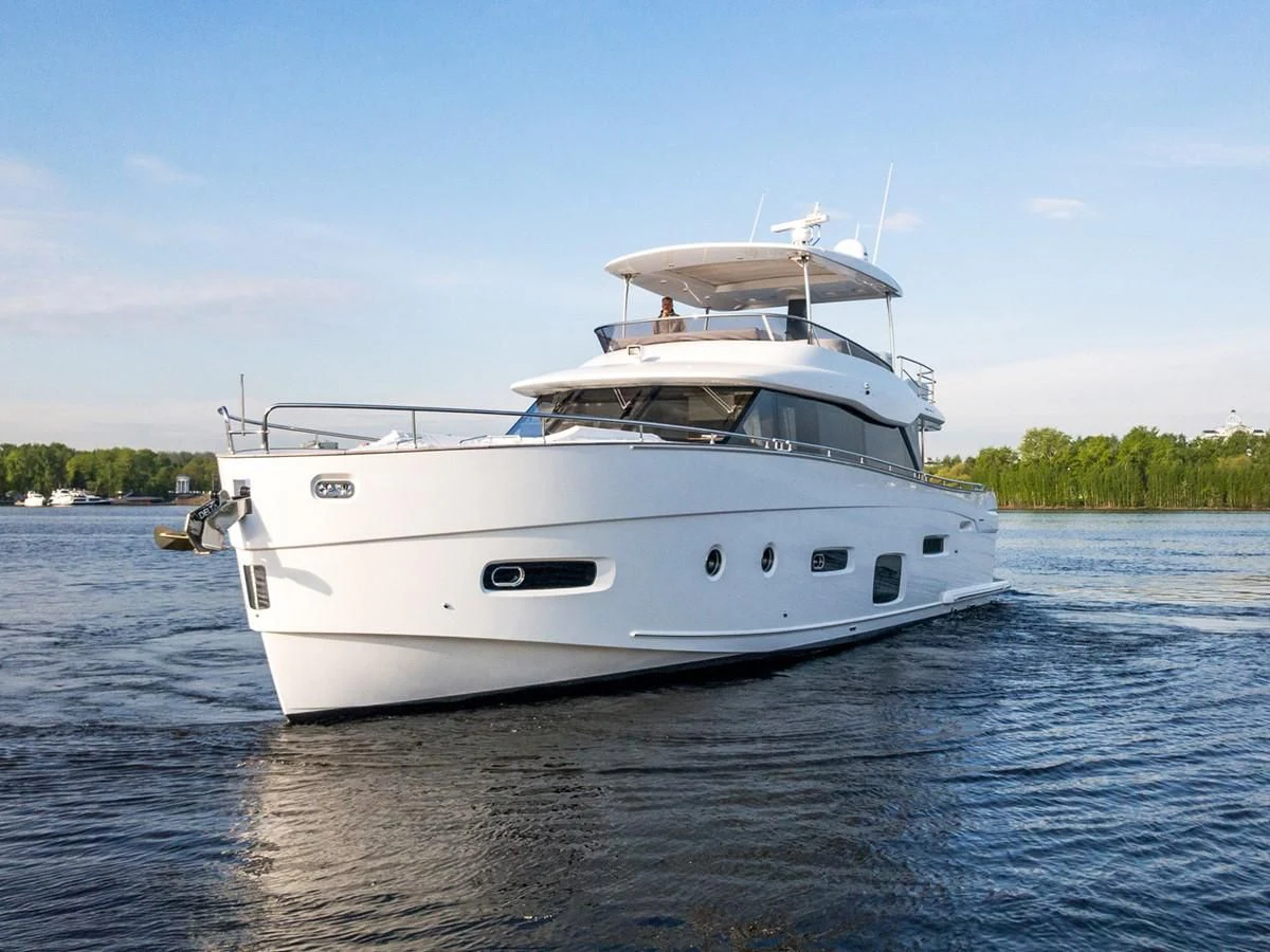a white yacht on the water aboard MAGELLANO 66 Yacht for Sale